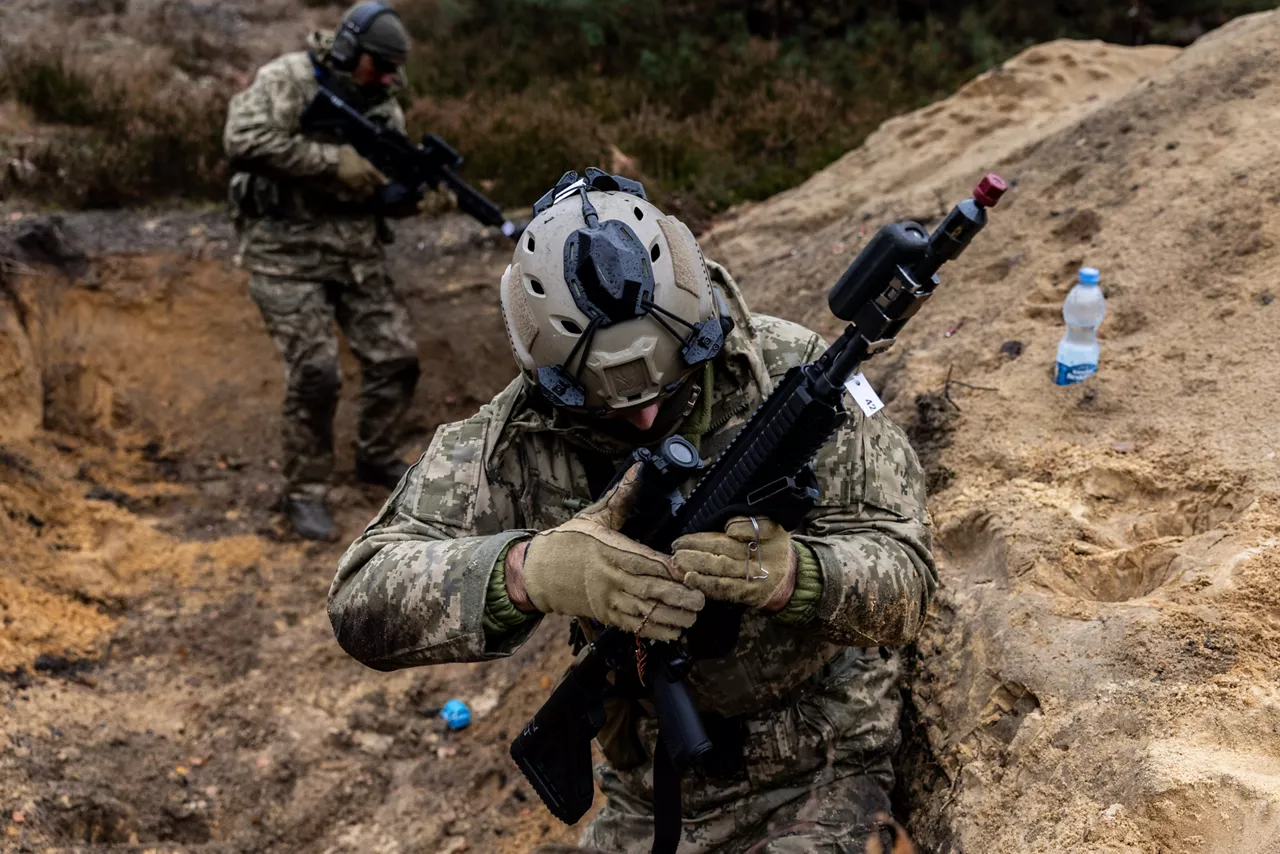 Ukrainian soldiers safe their rifles following a class on trench-clearing tactics at Camp Jomsborg in Poland. 

Camp Jomsborg was set up earlier this year as part of Operation Legio, an effort to train, equip and fund Ukraine’s armed forces, and is supported by Denmark, Estonia, Finland, Latvia, Lithuania, Norway, Sweden and Poland. Norway leads Legio, and its trainers work side-by-side with counterparts from the Estonian Army to equip Ukraine’s soldiers with the skills they need to fight and prevail on the battlefield.

