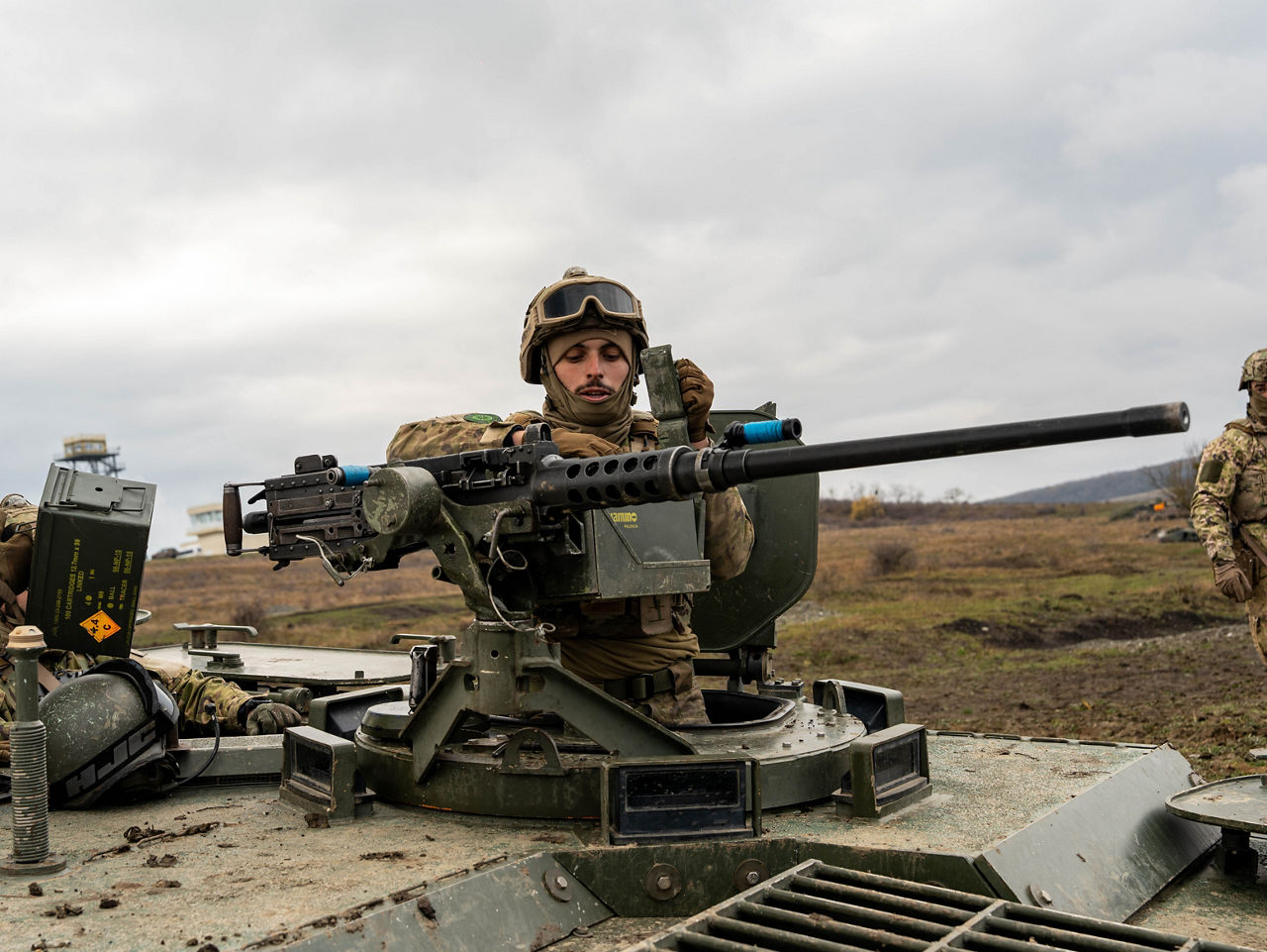 A Portuguese soldier prepares a .50 calibre machine gun atop an infantry fighting vehicle during Dacian Fall 25. 

NATO forces in Romania demonstrated their ability to expand from a multinational battlegroup to an armoured brigade, quickly absorbing thousands of French Army troops as part of exercise Dacian Fall 25. The drills included troops from Belgium, Bulgaria, France, Germany, Italy, Luxembourg, North Macedonia, Poland, Portugal, Romania, Spain and the United States. It ran from 20 October to 13 November 2025.
