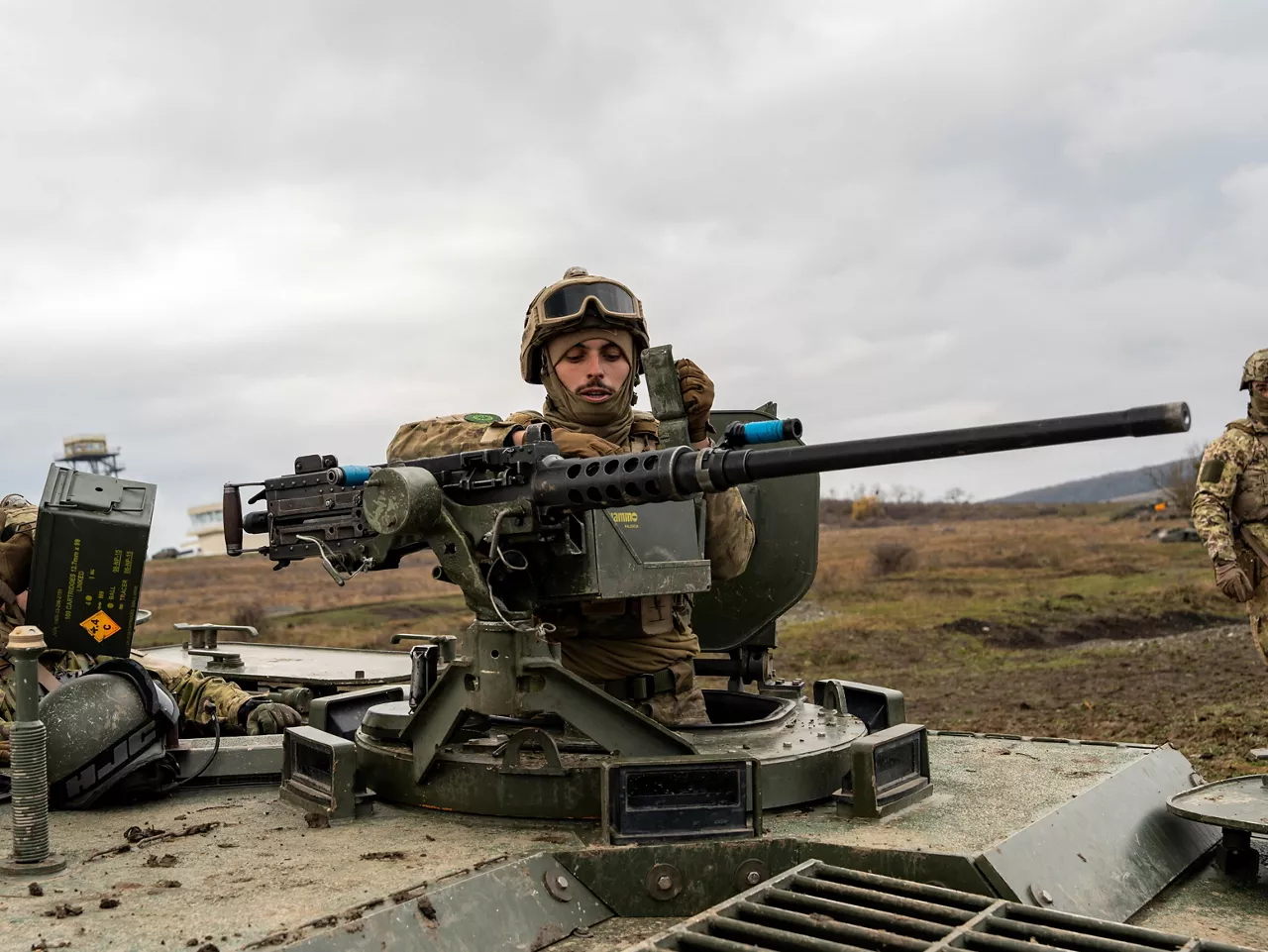A Portuguese soldier prepares a .50 calibre machine gun atop an infantry fighting vehicle during Dacian Fall 25. 

NATO forces in Romania demonstrated their ability to expand from a multinational battlegroup to an armoured brigade, quickly absorbing thousands of French Army troops as part of exercise Dacian Fall 25. The drills included troops from Belgium, Bulgaria, France, Germany, Italy, Luxembourg, North Macedonia, Poland, Portugal, Romania, Spain and the United States. It ran from 20 October to 13 November 2025.