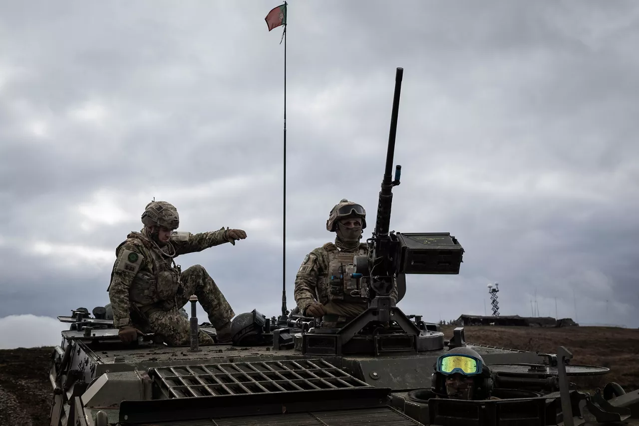 Portuguese soldiers take position aboard their infantry fighting vehicle during Dacian Fall 25. 

NATO forces in Romania demonstrated their ability to expand from a multinational battlegroup to an armoured brigade, quickly absorbing thousands of French Army troops as part of exercise Dacian Fall 25. The drills included troops from Belgium, Bulgaria, France, Germany, Italy, Luxembourg, North Macedonia, Poland, Portugal, Romania, Spain and the United States. It ran from 20 October to 13 November 2025.
