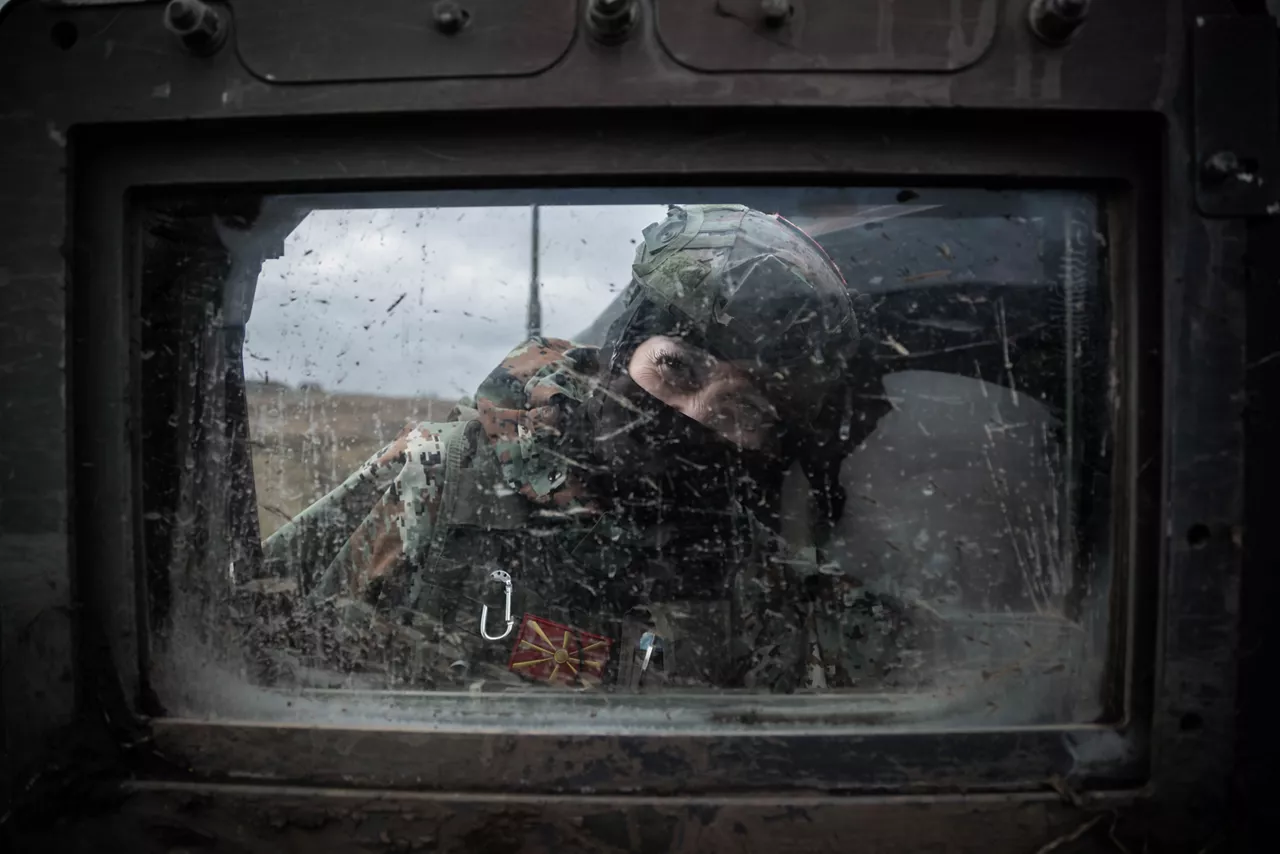 A female soldier from North Macedonia peers through Humvee window during Dacian Fall 25. 

NATO forces in Romania demonstrated their ability to expand from a multinational battlegroup to an armoured brigade, quickly absorbing thousands of French Army troops as part of exercise Dacian Fall 25. The drills included troops from Belgium, Bulgaria, France, Germany, Italy, Luxembourg, North Macedonia, Poland, Portugal, Romania, Spain and the United States. It ran from 20 October to 13 November 2025.