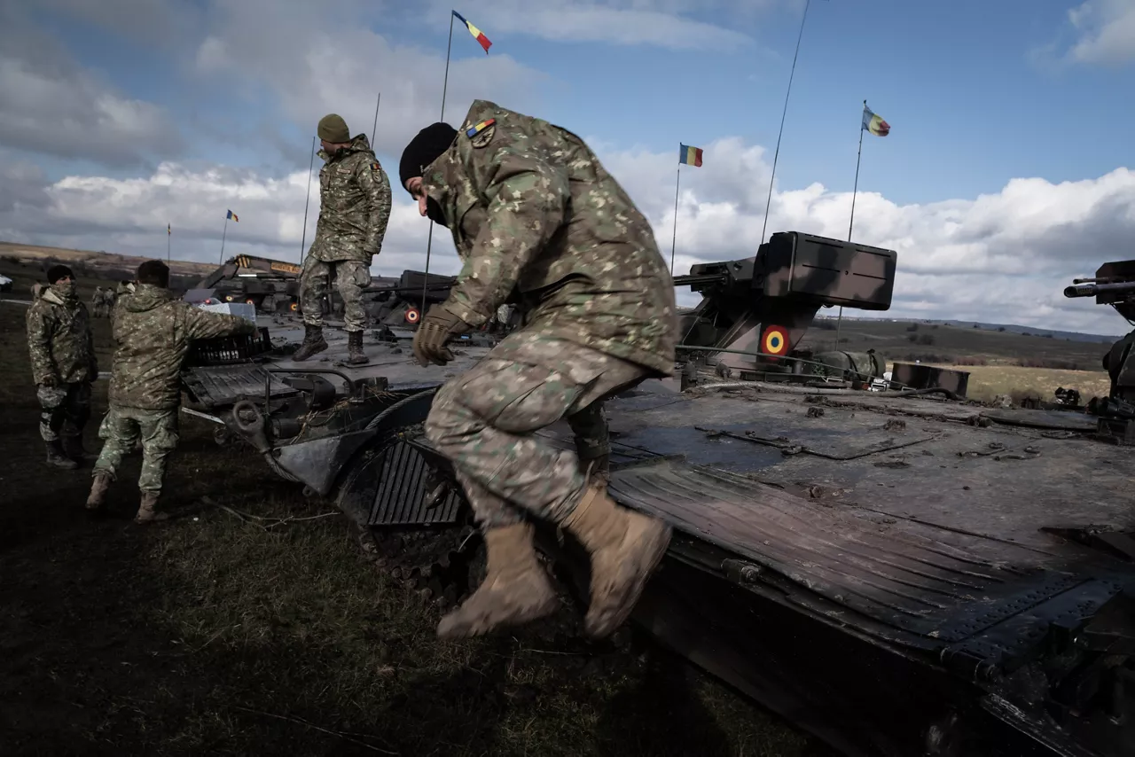 A Romanian soldier jumps to the ground from the front of an infantry fighting vehicle during Dacian Fall 25. 

NATO forces in Romania demonstrated their ability to expand from a multinational battlegroup to an armoured brigade, quickly absorbing thousands of French Army troops as part of exercise Dacian Fall 25. The drills included troops from Belgium, Bulgaria, France, Germany, Italy, Luxembourg, North Macedonia, Poland, Portugal, Romania, Spain and the United States. It ran from 20 October to 13 November 2025.