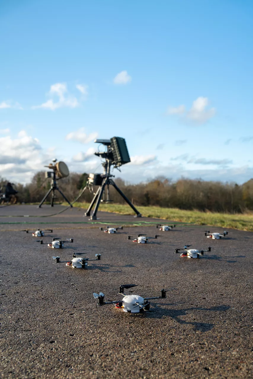 A drone swarm positioned and ready to participate in a counter-drone exercise.



NATO and its Allies are boosting our defence against the threat posed by drones with various initiatives. Part of these efforts is Project Flytrap 4.5, a US-led initiative designed to test and evaluate off-the-shelf, scalable, cutting-edge counter-drone technologies, for possible fast procurement and future integration into Allied air defence systems. These tested systems can help Allies to detect and destroy drones at a lower cost and higher efficiency.

