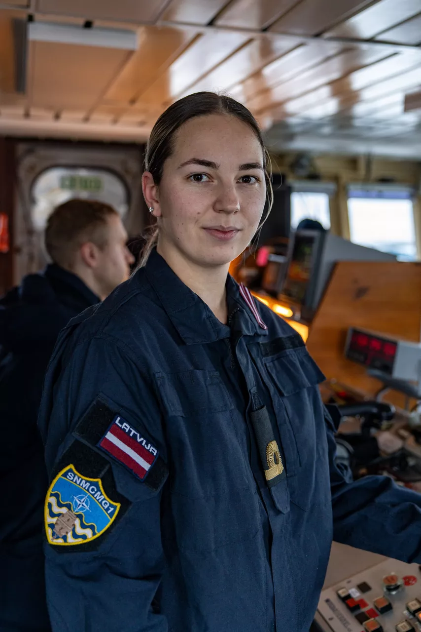 A Latvian Navy engineering officer manages the engines aboard SNMCMG1’s flagship LVNS Virsaitis during exercise Freezing Winds.

NATO and its Allies are intensifying efforts to protect vital sea routes and critical infrastructure. Exercise Freezing Winds 2025 brought together ships from Standing NATO Mine Countermeasures Group One (SNMCMG1) and other Allied units to train side by side in the Baltic Sea’s harsh winter conditions. Over several days, naval forces, divers, and mine counter-measure teams practised joint operations to ensure readiness against diverse threats — from detecting and neutralising underwater threats to responding to disruptions affecting vital sea lines of communication. This exercise complements NATO’s Baltic Sentry enhanced vigilance activity, launched in January 2025 to strengthen surveillance and monitoring across the region. The exercise took place from 24 November to 4 December 2025.
