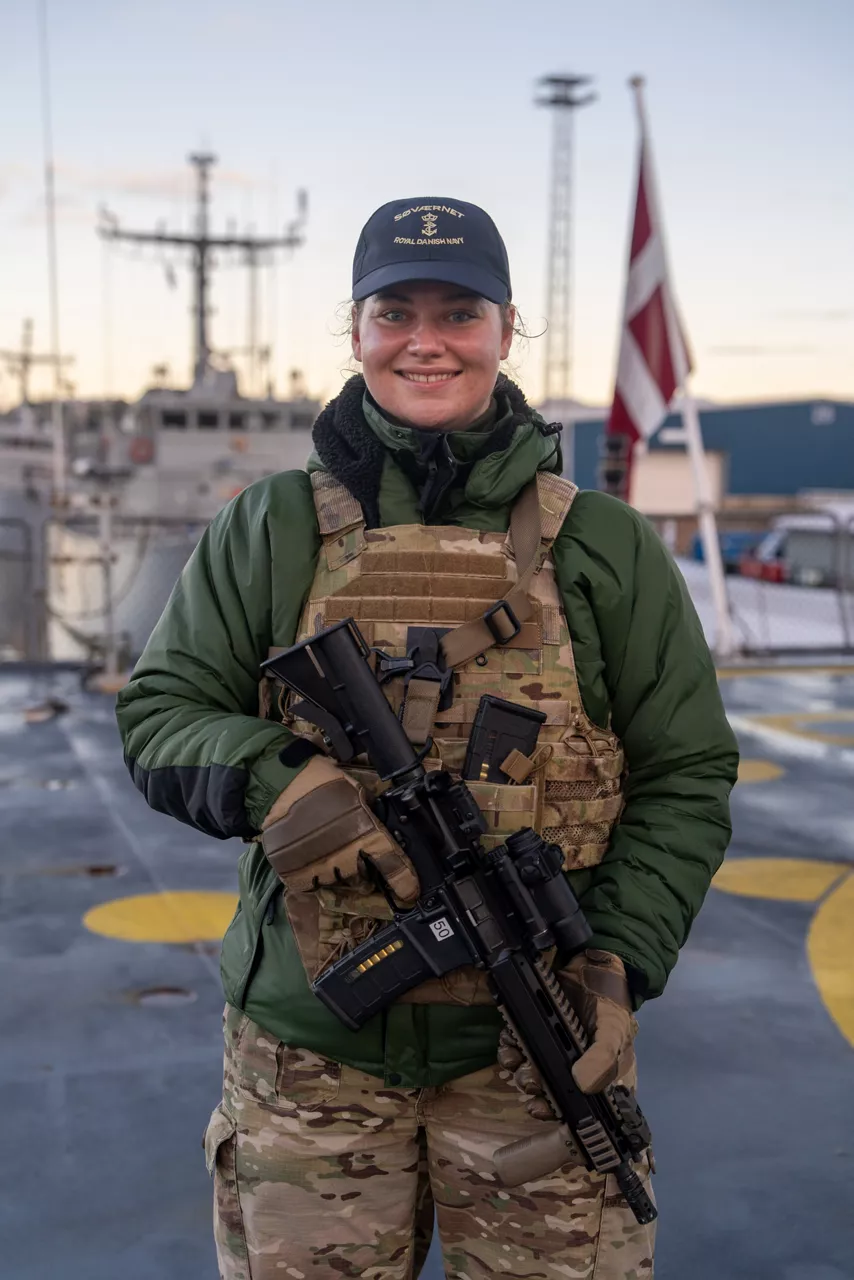 A Danish sailor on guard duty aboard the frigate HDMS Niels Juel smiles at the camera during exercise Freezing Winds.

NATO and its Allies are intensifying efforts to protect vital sea routes and critical infrastructure. Exercise Freezing Winds 2025 brought together ships from Standing NATO Mine Countermeasures Group One (SNMCMG1) and other Allied units to train side by side in the Baltic Sea’s harsh winter conditions. Over several days, naval forces, divers, and mine counter-measure teams practised joint operations to ensure readiness against diverse threats — from detecting and neutralising underwater threats to responding to disruptions affecting vital sea lines of communication. This exercise complements NATO’s Baltic Sentry enhanced vigilance activity, launched in January 2025 to strengthen surveillance and monitoring across the region. The exercise took place from 24 November to 4 December 2025.
