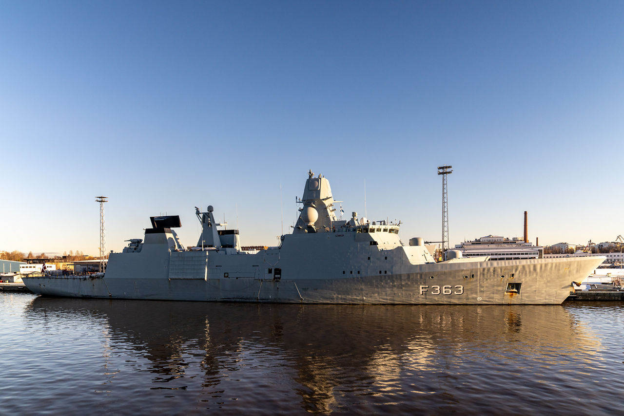 Danish frigate HDMS Niels Juel docks at the port of Turku as it prepares for exercise Freezing Winds.

NATO and its Allies are intensifying efforts to protect vital sea routes and critical infrastructure. Exercise Freezing Winds 2025 brought together ships from Standing NATO Mine Countermeasures Group One (SNMCMG1) and other Allied units to train side by side in the Baltic Sea’s harsh winter conditions. Over several days, naval forces, divers, and mine counter-measure teams practised joint operations to ensure readiness against diverse threats — from detecting and neutralising underwater threats to responding to disruptions affecting vital sea lines of communication. This exercise complements NATO’s Baltic Sentry enhanced vigilance activity, launched in January 2025 to strengthen surveillance and monitoring across the region. The exercise took place from 24 November to 4 December 2025.