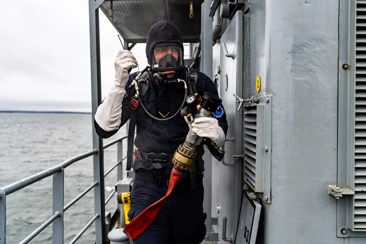 A Latvian sailor aboard SNMCMG1’s flagship LVNS Virsaitis conducts firefighting drills during exercise Freezing Winds.

NATO and its Allies are intensifying efforts to protect vital sea routes and critical infrastructure. Exercise Freezing Winds 2025 brought together ships from Standing NATO Mine Countermeasures Group One (SNMCMG1) and other Allied units to train side by side in the Baltic Sea’s harsh winter conditions. Over several days, naval forces, divers, and mine counter-measure teams practised joint operations to ensure readiness against diverse threats — from detecting and neutralising underwater threats to responding to disruptions affecting vital sea lines of communication. This exercise complements NATO’s Baltic Sentry enhanced vigilance activity, launched in January 2025 to strengthen surveillance and monitoring across the region. The exercise took place from 24 November to 4 December 2025.