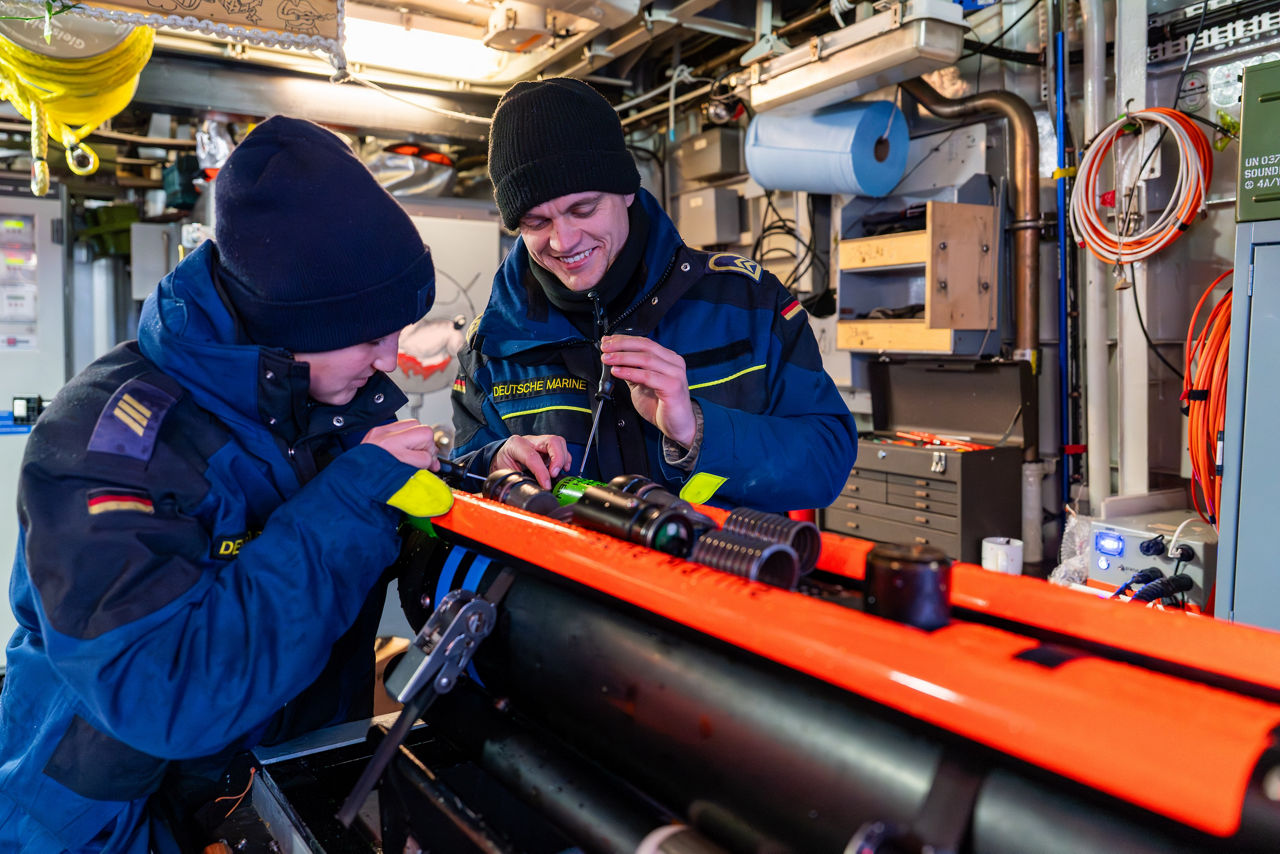 German sailors aboard the minehunter FGS Dillingen maintain an underwater drone after mine countermeasure operations during exercise Freezing Winds.

NATO and its Allies are intensifying efforts to protect vital sea routes and critical infrastructure. Exercise Freezing Winds 2025 brought together ships from Standing NATO Mine Countermeasures Group One (SNMCMG1) and other Allied units to train side by side in the Baltic Sea’s harsh winter conditions. Over several days, naval forces, divers, and mine counter-measure teams practised joint operations to ensure readiness against diverse threats — from detecting and neutralising underwater threats to responding to disruptions affecting vital sea lines of communication. This exercise complements NATO’s Baltic Sentry enhanced vigilance activity, launched in January 2025 to strengthen surveillance and monitoring across the region. The exercise took place from 24 November to 4 December 2025.