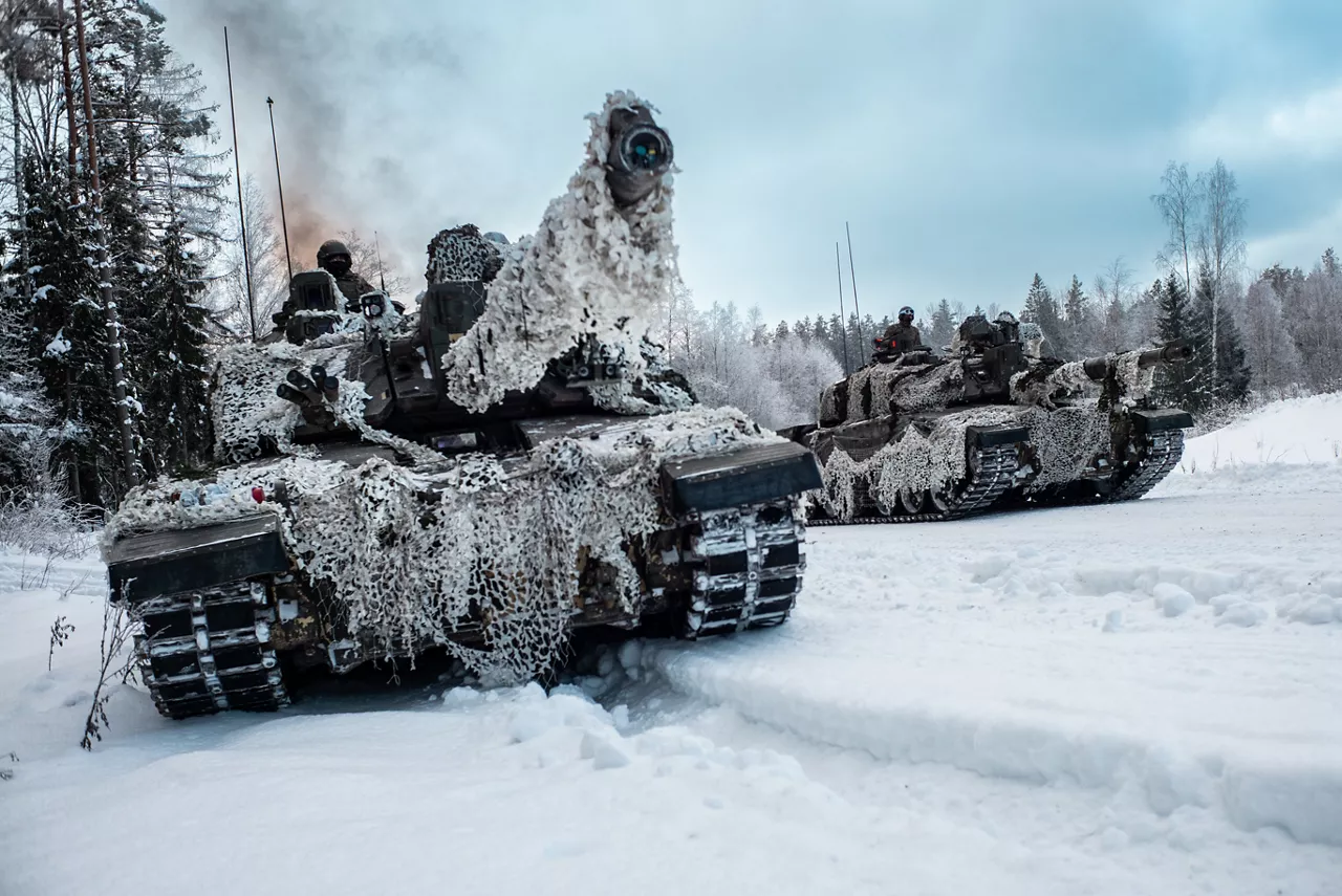 British Army Challenger 2 main battle tanks advance down a road near Tapa, Estonia.



During exercise Winter Camp, NATO’s multinational battlegroup in Estonia braved bitterly cold temperatures as units trained together in demanding winter conditions. The unforgiving environment allowed Allied troops to refine their cold‑weather techniques and demonstrate their ability to defend their territory under any circumstances.