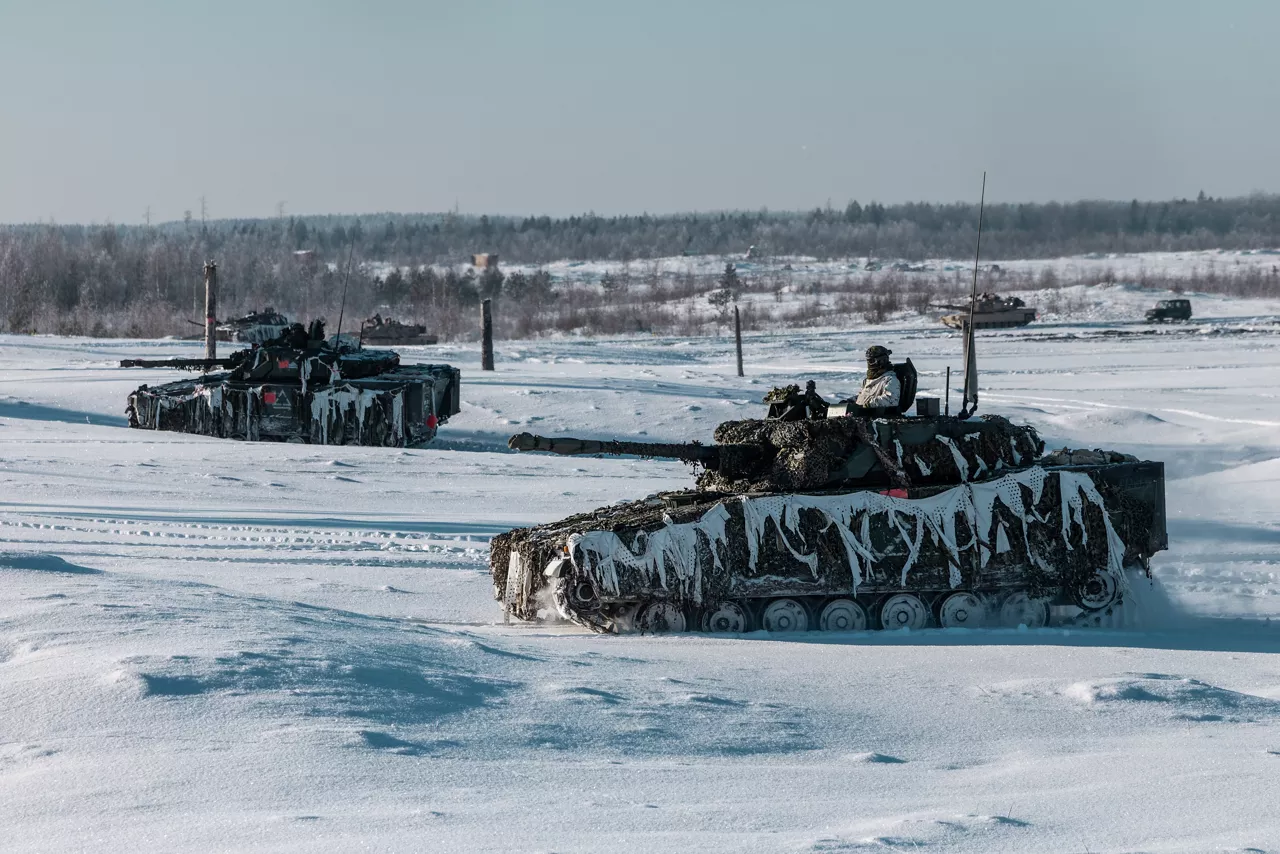 Estonian Army CV90 infantry fighting vehicles support an infantry counterattack near Tapa, Estonia.



During exercise Winter Camp, NATO’s multinational battlegroup in Estonia braved bitterly cold temperatures as units trained together in demanding winter conditions. The unforgiving environment allowed Allied troops to refine their cold‑weather techniques and demonstrate their ability to defend their territory under any circumstances.