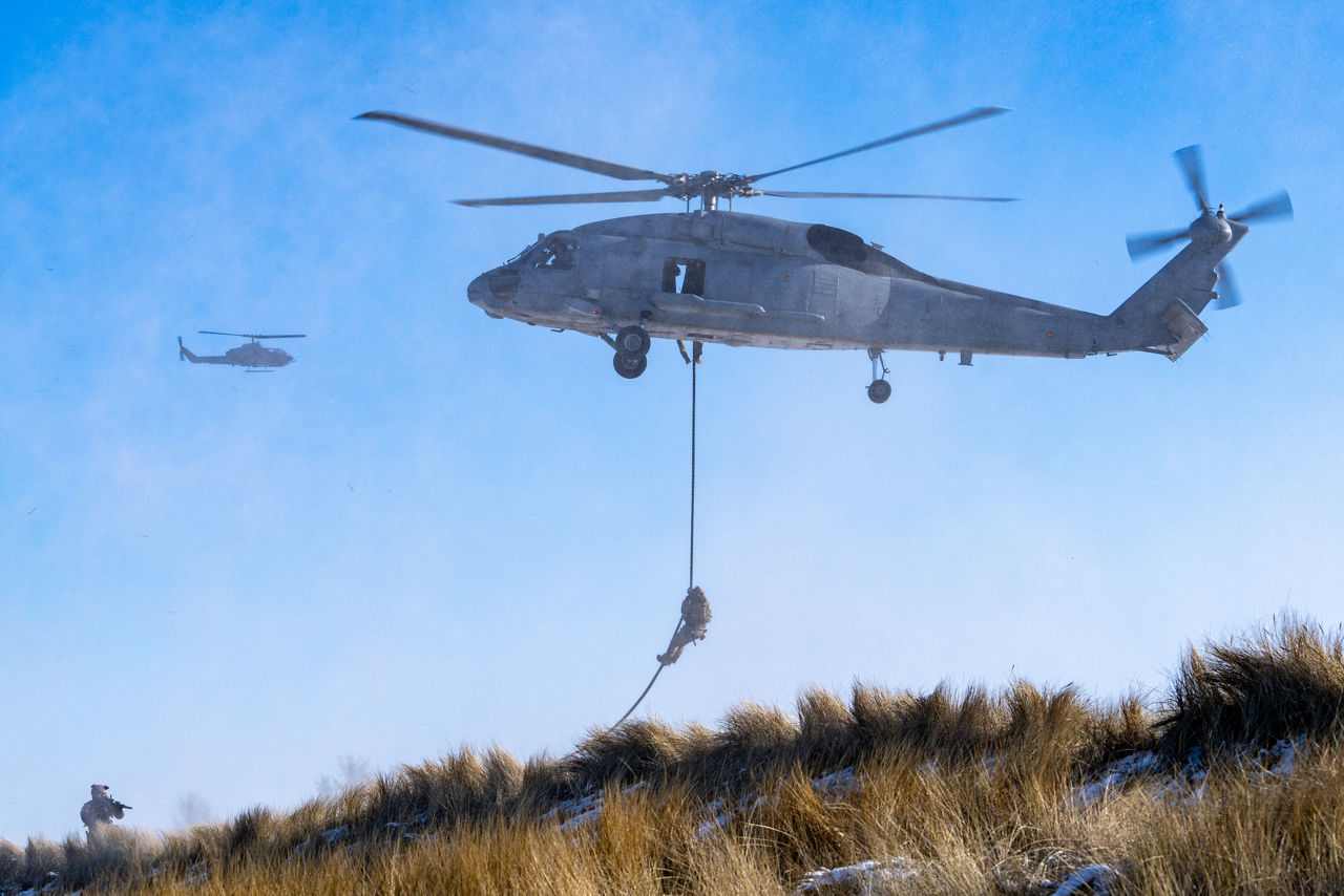 Spanish Seahawk helicopters maintain a steady hover while troops fast‑rope to the beach during amphibious operations in exercise Steadfast Dart 26.

Between January and March, around 10,000 troops from 13 NATO Allies deployed across Europe for exercise Steadfast Dart 26 — the Alliance’s largest and most visible drill of the year. The exercise brought together 17 naval vessels, more than 20 aircraft and roughly 1,500 military vehicles in Germany, testing NATO’s rapid reinforcement and coordination across land, air, sea and cyber domains.