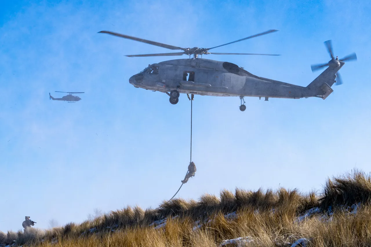 Spanish Seahawk helicopters maintain a steady hover while troops fast‑rope to the beach during amphibious operations in exercise Steadfast Dart 26.

Between January and March, around 10,000 troops from 13 NATO Allies deployed across Europe for exercise Steadfast Dart 26 — the Alliance’s largest and most visible drill of the year. The exercise brought together 17 naval vessels, more than 20 aircraft and roughly 1,500 military vehicles in Germany, testing NATO’s rapid reinforcement and coordination across land, air, sea and cyber domains.