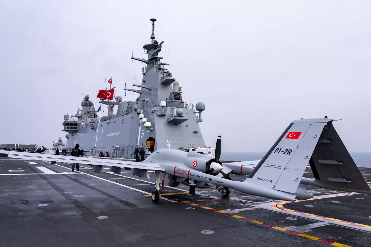 A Turkish TB3 drone lines the flight deck of TCG Anadolu.

Between January and March, around 10,000 troops from 13 NATO Allies deployed across Europe for exercise Steadfast Dart 26 — the Alliance’s largest and most visible drill of the year. The exercise brought together 17 naval vessels, more than 20 aircraft and roughly 1,500 military vehicles in Germany, testing NATO’s rapid reinforcement and coordination across land, air, sea and cyber domains.
