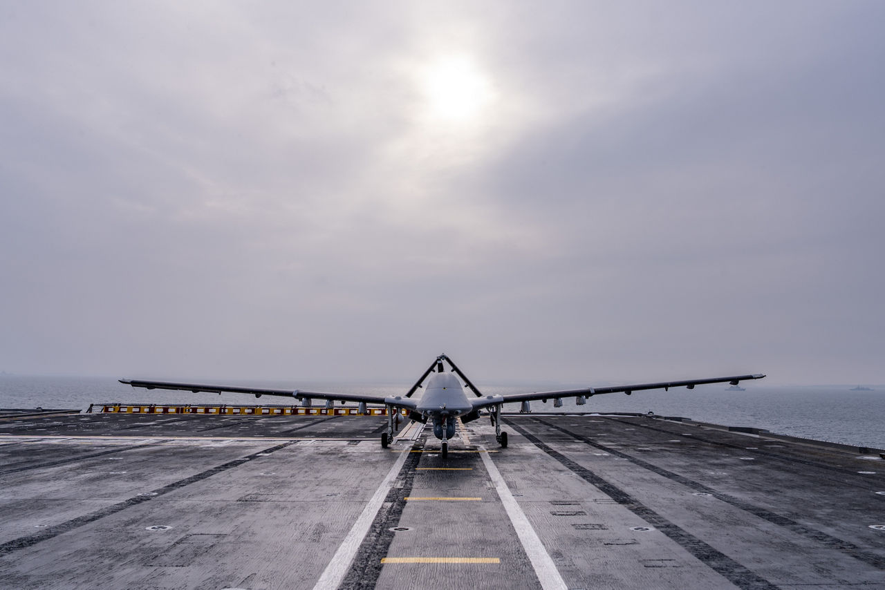 A Turkish TB3 drone lines the flight deck of TCG Anadolu.

Between January and March, around 10,000 troops from 13 NATO Allies deployed across Europe for exercise Steadfast Dart 26 — the Alliance’s largest and most visible drill of the year. The exercise brought together 17 naval vessels, more than 20 aircraft and roughly 1,500 military vehicles in Germany, testing NATO’s rapid reinforcement and coordination across land, air, sea and cyber domains.
