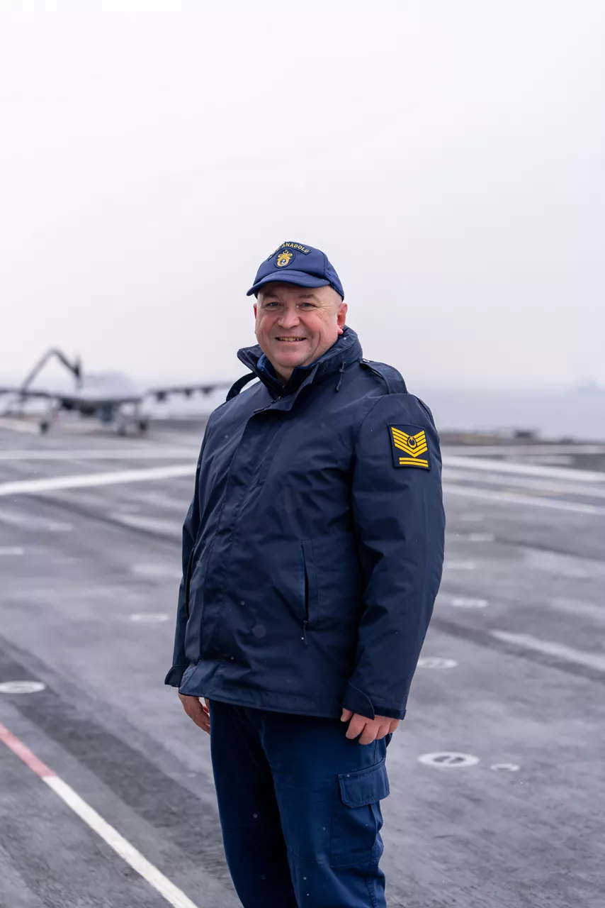 A Turkish sailor stands for a photo on the flight deck of TCG Anadolu during exercise Steadfast Dart 26.

Between January and March, around 10,000 troops from 13 NATO Allies deployed across Europe for exercise Steadfast Dart 26 — the Alliance’s largest and most visible drill of the year. The exercise brought together 17 naval vessels, more than 20 aircraft and roughly 1,500 military vehicles in Germany, testing NATO’s rapid reinforcement and coordination across land, air, sea and cyber domains.
