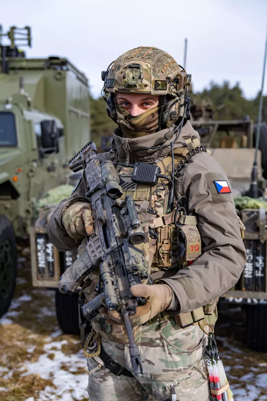A Czech soldier looks toward the camera during exercise Steadfast Dart 26.

Between January and March, around 10,000 troops from 13 NATO Allies deployed across Europe for exercise Steadfast Dart 26 — the Alliance’s largest and most visible drill of the year. The exercise brought together 17 naval vessels, more than 20 aircraft and roughly 1,500 military vehicles in Germany, testing NATO’s rapid reinforcement and coordination across land, air, sea and cyber domains.