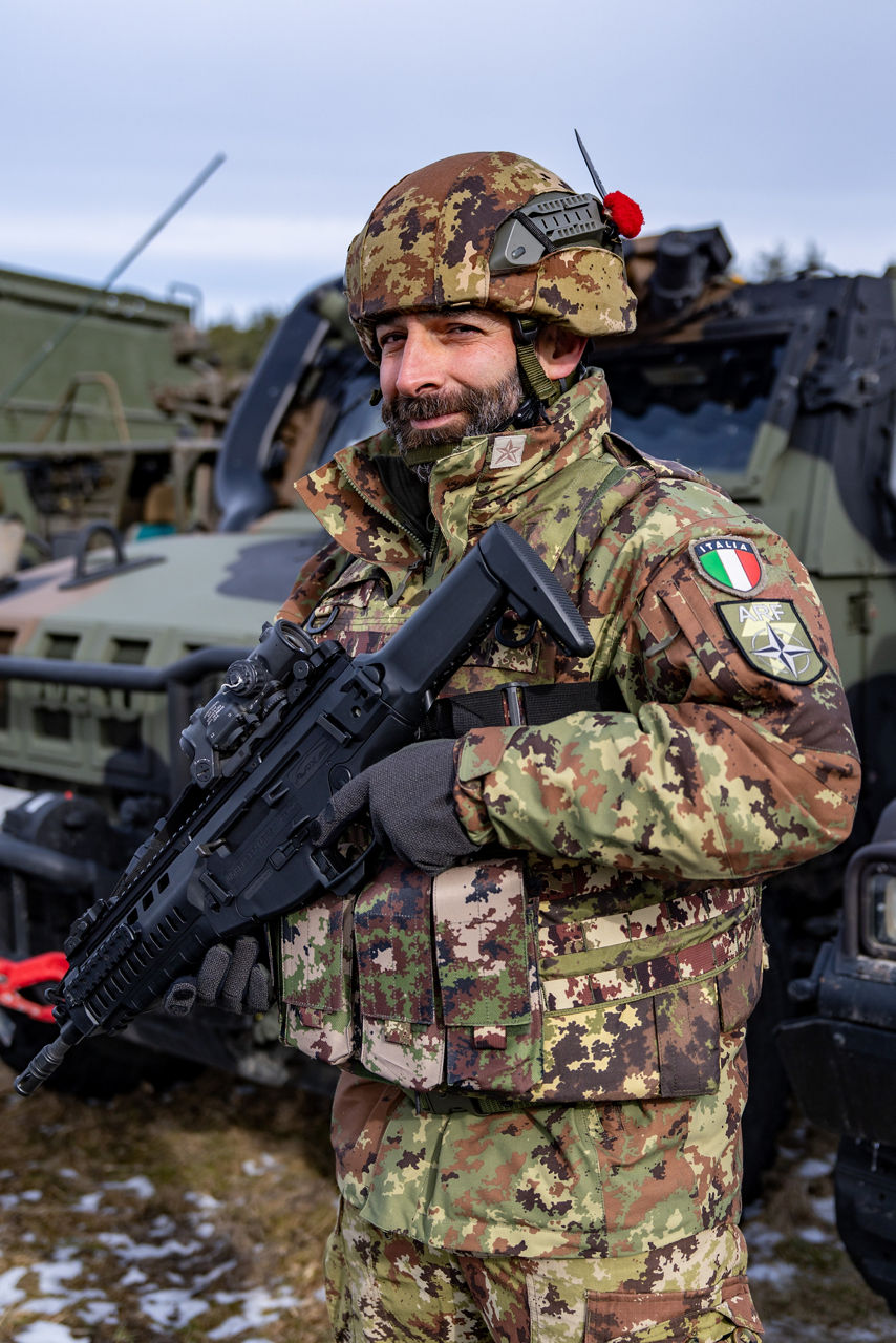 An Italian soldier poses for a photo during exercise Steadfast Dart 26.

Between January and March, around 10,000 troops from 13 NATO Allies deployed across Europe for exercise Steadfast Dart 26 — the Alliance’s largest and most visible drill of the year. The exercise brought together 17 naval vessels, more than 20 aircraft and roughly 1,500 military vehicles in Germany, testing NATO’s rapid reinforcement and coordination across land, air, sea and cyber domains.