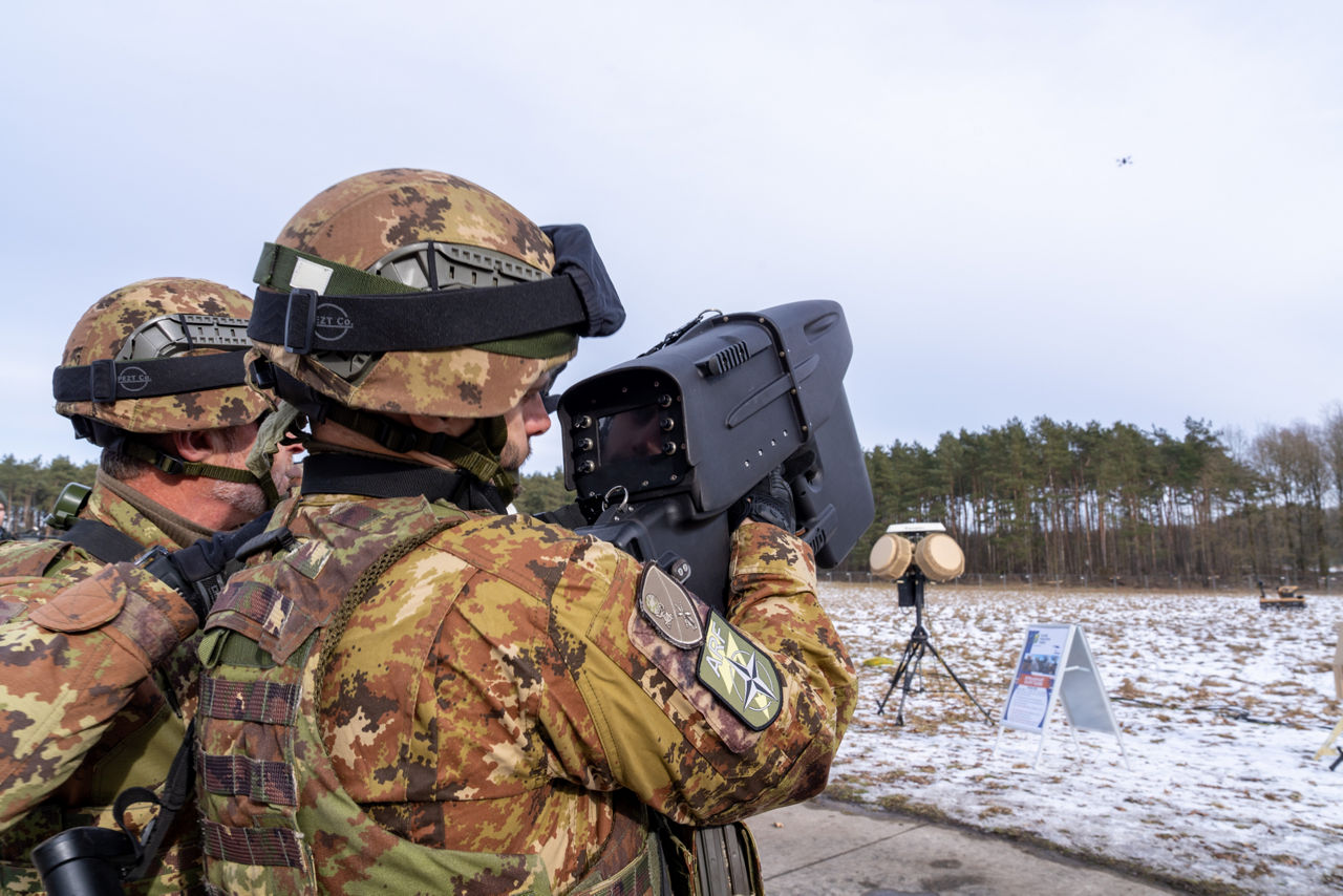 Italian soldiers use their drone‑jamming capabilities to control the drone during exercise Steadfast Dart 26.

Between January and March, around 10,000 troops from 13 NATO Allies deployed across Europe for exercise Steadfast Dart 26 — the Alliance’s largest and most visible drill of the year. The exercise brought together 17 naval vessels, more than 20 aircraft and roughly 1,500 military vehicles in Germany, testing NATO’s rapid reinforcement and coordination across land, air, sea and cyber domains.