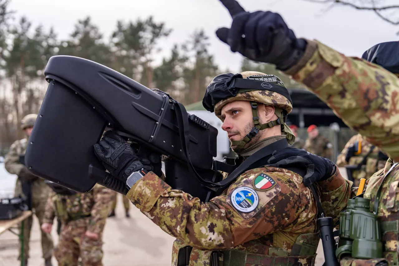 Italian soldiers use their drone‑jamming capabilities to control the drone during exercise Steadfast Dart 26.

Between January and March, around 10,000 troops from 13 NATO Allies deployed across Europe for exercise Steadfast Dart 26 — the Alliance’s largest and most visible drill of the year. The exercise brought together 17 naval vessels, more than 20 aircraft and roughly 1,500 military vehicles in Germany, testing NATO’s rapid reinforcement and coordination across land, air, sea and cyber domains.