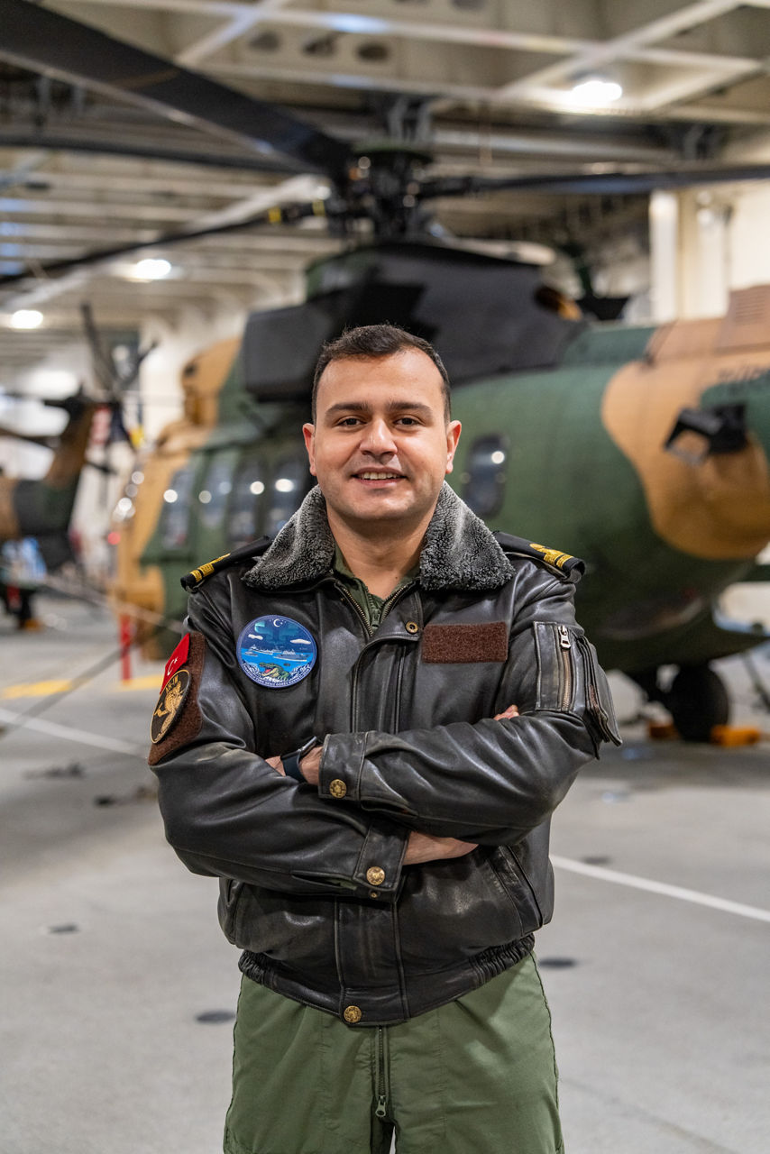 A Turkish helicopter pilot stands aboard TCG Anadolu during exercise Steadfast Dart 26.

Between January and March, around 10,000 troops from 13 NATO Allies deployed across Europe for exercise Steadfast Dart 26 — the Alliance’s largest and most visible drill of the year. The exercise brought together 17 naval vessels, more than 20 aircraft and roughly 1,500 military vehicles in Germany, testing NATO’s rapid reinforcement and coordination across land, air, sea and cyber domains.