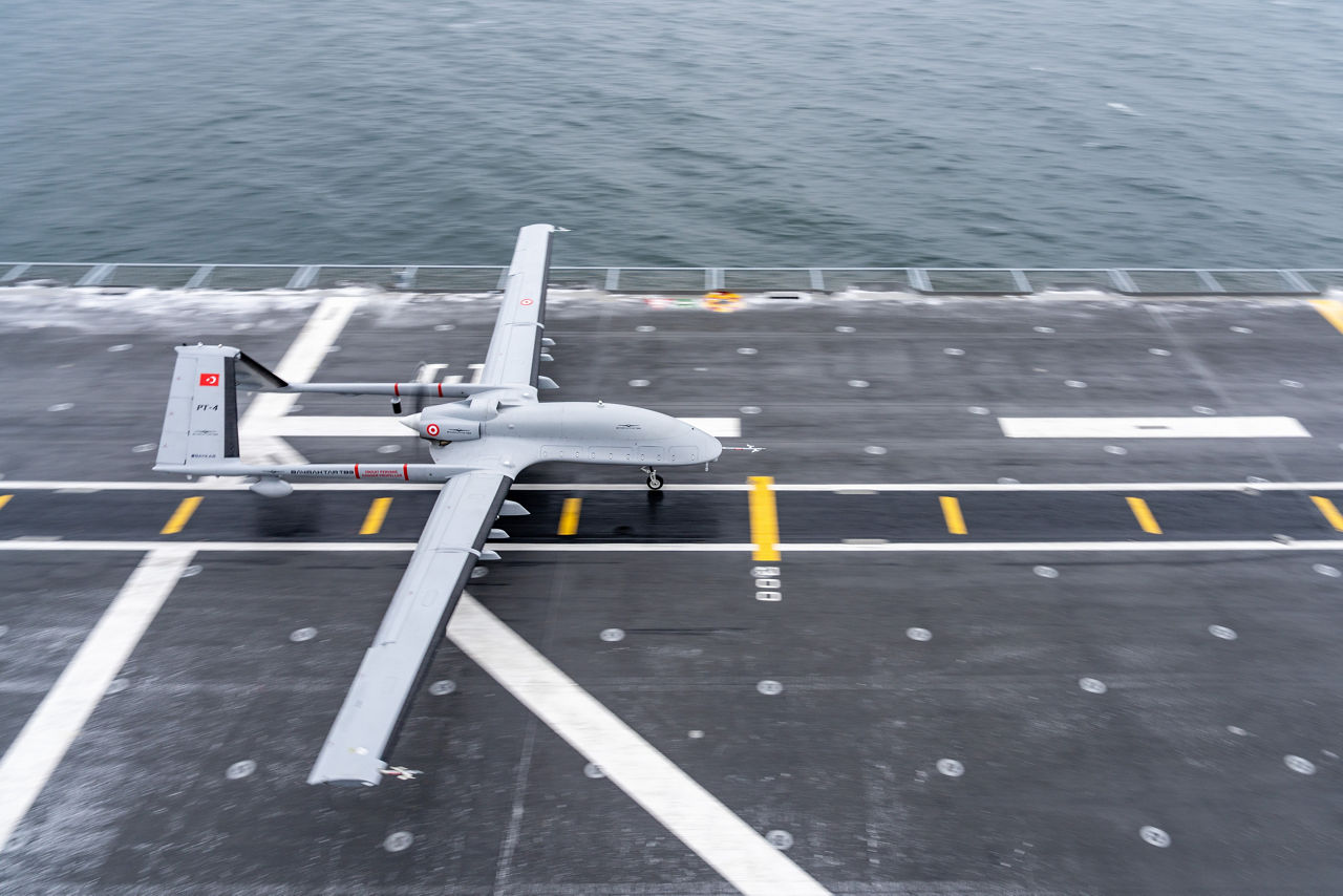 A Turkish TB3 drone takes off from TCG Anadolu during exercise Steadfast Dart 26.

Between January and March, around 10,000 troops from 13 NATO Allies deployed across Europe for exercise Steadfast Dart 26 — the Alliance’s largest and most visible drill of the year. The exercise brought together 17 naval vessels, more than 20 aircraft and roughly 1,500 military vehicles in Germany, testing NATO’s rapid reinforcement and coordination across land, air, sea and cyber domains.
