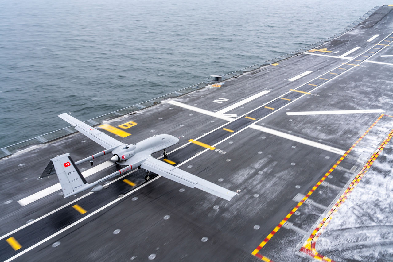 A Turkish TB3 drone takes off from TCG Anadolu during exercise Steadfast Dart 26.

Between January and March, around 10,000 troops from 13 NATO Allies deployed across Europe for exercise Steadfast Dart 26 — the Alliance’s largest and most visible drill of the year. The exercise brought together 17 naval vessels, more than 20 aircraft and roughly 1,500 military vehicles in Germany, testing NATO’s rapid reinforcement and coordination across land, air, sea and cyber domains.