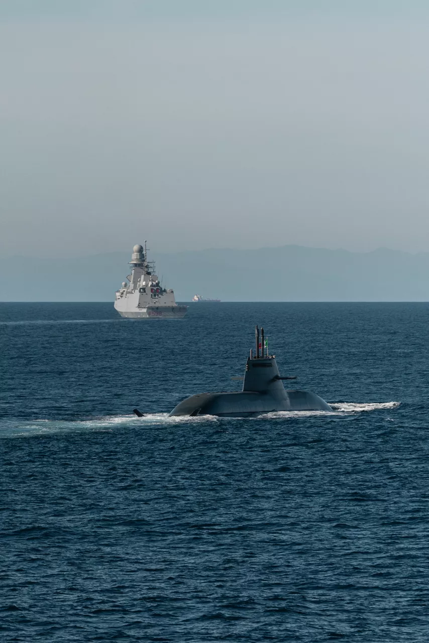 An Italian Navy submarine sails behind an Italian Navy frigate during Exercise Dynamic Manta 26. The exercise, held annually by NATO Allied Maritime Command, tests Allied Anti-Submarine Warfare capabilities in a series of sub-hunting drills off the coast of Sicily. This year’s iteration gathered ship, submarines and aircraft from nine Allies, including Canada, France, Germany, Greece, Italy, Portugal, Türkiye, the United Kingdom and the United States.
