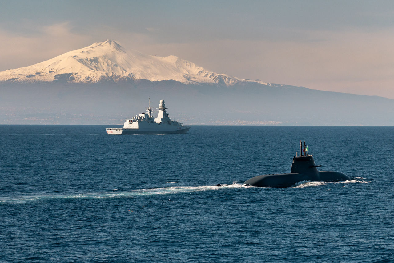An Italian Navy submarine sails behind an Italian Navy frigate during Exercise Dynamic Manta 26. The exercise, held annually by NATO Allied Maritime Command, tests Allied Anti-Submarine Warfare capabilities in a series of sub-hunting drills off the coast of Sicily. This year’s iteration gathered ship, submarines and aircraft from nine Allies, including Canada, France, Germany, Greece, Italy, Portugal, Turkey, the United Kingdom and the United States.