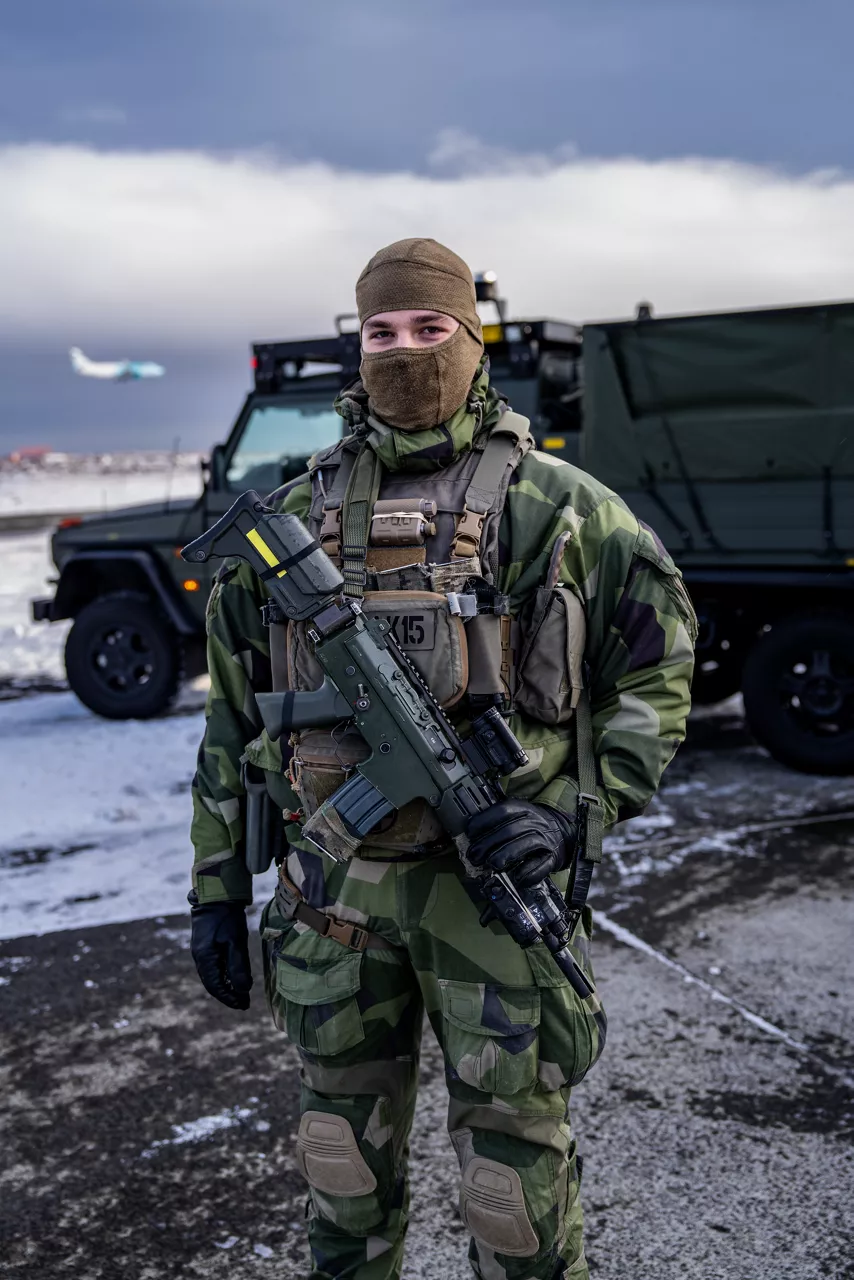 A Swedish Air Force security trooper stands outside a hardened aircraft shelter at Keflavik Air Base in Iceland while deployed as part of NATO’s Arctic Sentry activity. Arctic Sentry is a NATO vigilance activity aimed at enhancing security in the north, helping to make the Alliance safer. As part of this initiative, Sweden deployed a detachment of six Gripens to Keflavik Air Base to safeguard Icelandic airspace against threats or intrusions. Their deployment is also part of NATO’s Iceland Air Policing mission, marking the first time Sweden has led an air policing mission since joining NATO two years ago as its 32nd member. Situated in the middle of the North Atlantic, Iceland plays a vital role in helping Allies maintain situational awareness in the High North.