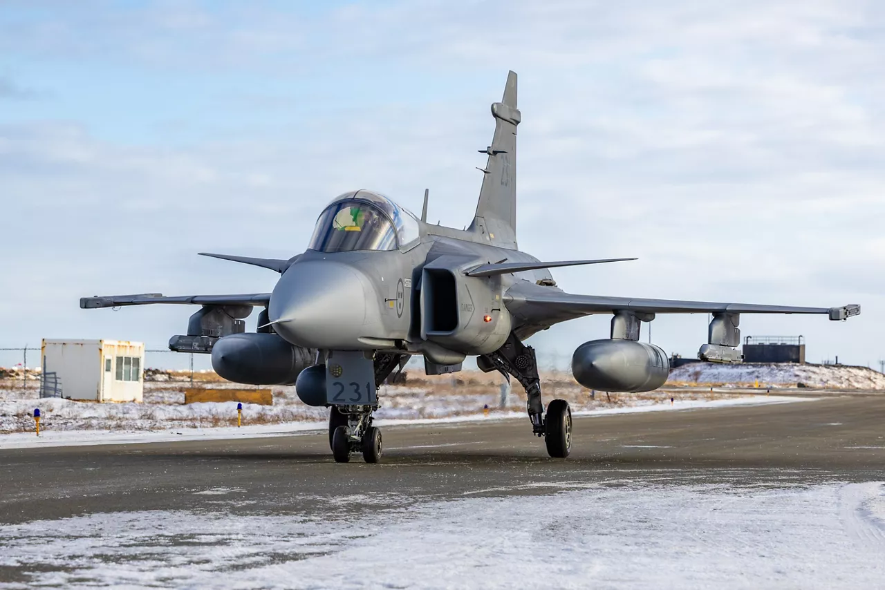 A Swedish Air Force JAS 39 Gripen fighter rolls down the taxiway at Keflavik Air Base in Iceland while deployed as part of NATO’s Arctic Sentry activity. Arctic Sentry is a NATO vigilance activity aimed at enhancing security in the north, helping to make the Alliance safer. As part of this initiative, Sweden deployed a detachment of six Gripens to Keflavik Air Base to safeguard Icelandic airspace against threats or intrusions. Their deployment is also part of NATO’s Iceland Air Policing mission, marking the first time Sweden has led an air policing mission since joining NATO two years ago as its 32nd member. Situated in the middle of the North Atlantic, Iceland plays a vital role in helping Allies maintain situational awareness in the High North. Photo courtesy of NATO Allied Air Command.