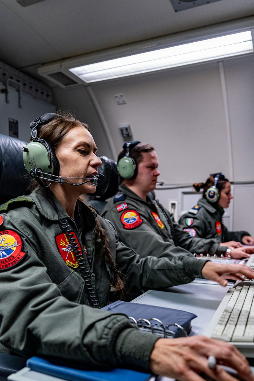 Aircrew from Canada, Denmark and Italy monitor the skies from aboard a NATO E‑3A Airborne Warning and Control System (AWACS) aircraft.

NATO’s Airborne Warning and Control System (AWACS) launched its first surveillance flight over the Barents Sea on 6 March 2026 in support of the enhanced vigilance activity “Arctic Sentry.” Arctic Sentry brings together exercises, troops and capabilities from several NATO Allies across the Arctic and the High North. By boosting surveillance and sharpening joint readiness, ”Arctic Sentry”  helps ensure that NATO and Allies can respond together to challenges in one of the world’s most strategically important regions.