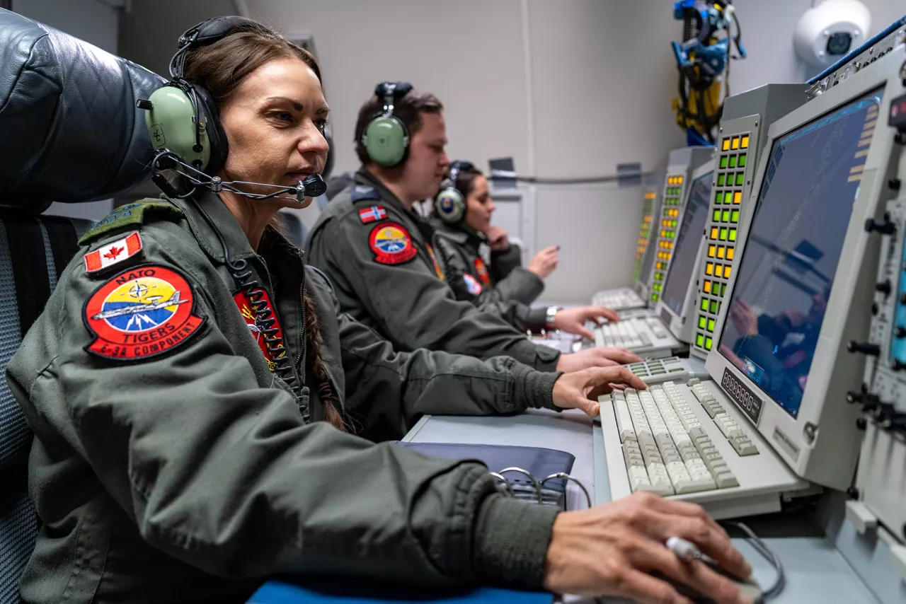 Aircrew from Canada, Denmark and Italy monitor the skies from aboard a NATO E‑3A Airborne Warning and Control System (AWACS) aircraft.

NATO’s Airborne Warning and Control System (AWACS) launched its first surveillance flight over the Barents Sea on 6 March 2026 in support of the enhanced vigilance activity “Arctic Sentry.” Arctic Sentry brings together exercises, troops and capabilities from several NATO Allies across the Arctic and the High North. By boosting surveillance and sharpening joint readiness, ”Arctic Sentry”  helps ensure that NATO and Allies can respond together to challenges in one of the world’s most strategically important regions.