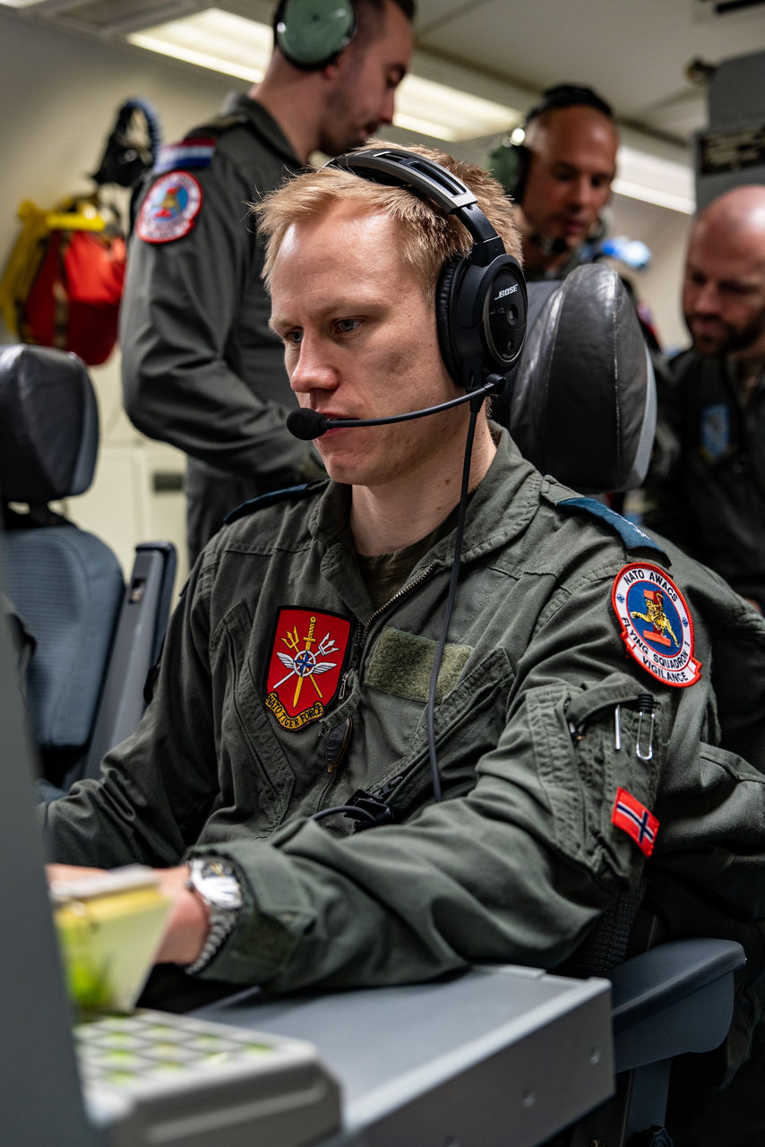 A Norwegian aircrew member monitors the skies from aboard a NATO E‑3A Airborne Warning and Control System (AWACS) aircraft.

NATO’s Airborne Warning and Control System (AWACS) launched its first surveillance flight over the Barents Sea on 6 March 2026 in support of the enhanced vigilance activity “Arctic Sentry.” Arctic Sentry brings together exercises, troops and capabilities from several NATO Allies across the Arctic and the High North. By boosting surveillance and sharpening joint readiness, ”Arctic Sentry”  helps ensure that NATO and Allies can respond together to challenges in one of the world’s most strategically important regions.