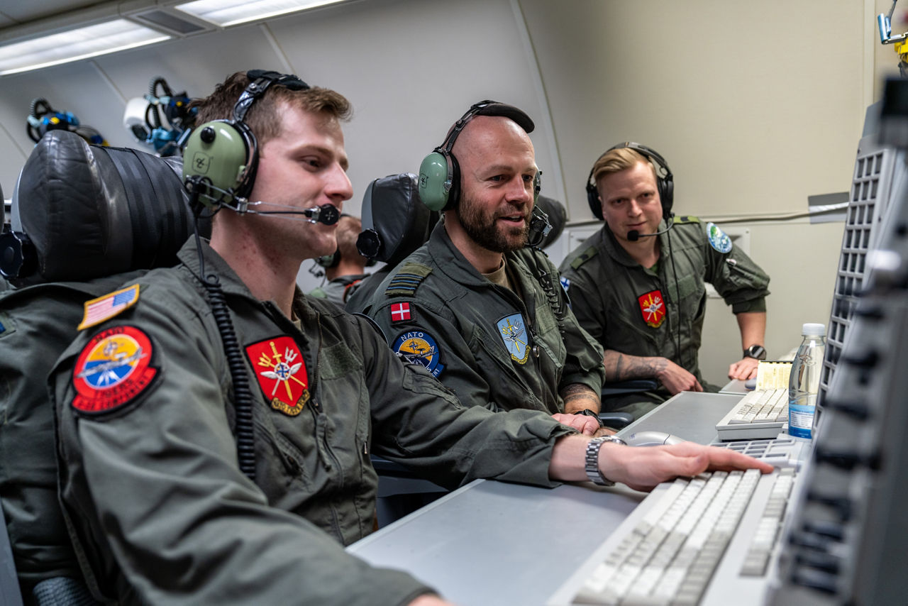 Aircrew from Denmark, Finland and the United States monitor the skies aboard a NATO E‑3A Airborne Warning and Control System (AWACS) aircraft.

NATO’s Airborne Warning and Control System (AWACS) launched its first surveillance flight over the Barents Sea on 6 March 2026 in support of the enhanced vigilance activity “Arctic Sentry.” Arctic Sentry brings together exercises, troops and capabilities from several NATO Allies across the Arctic and the High North. By boosting surveillance and sharpening joint readiness, ”Arctic Sentry”  helps ensure that NATO and Allies can respond together to challenges in one of the world’s most strategically important regions.