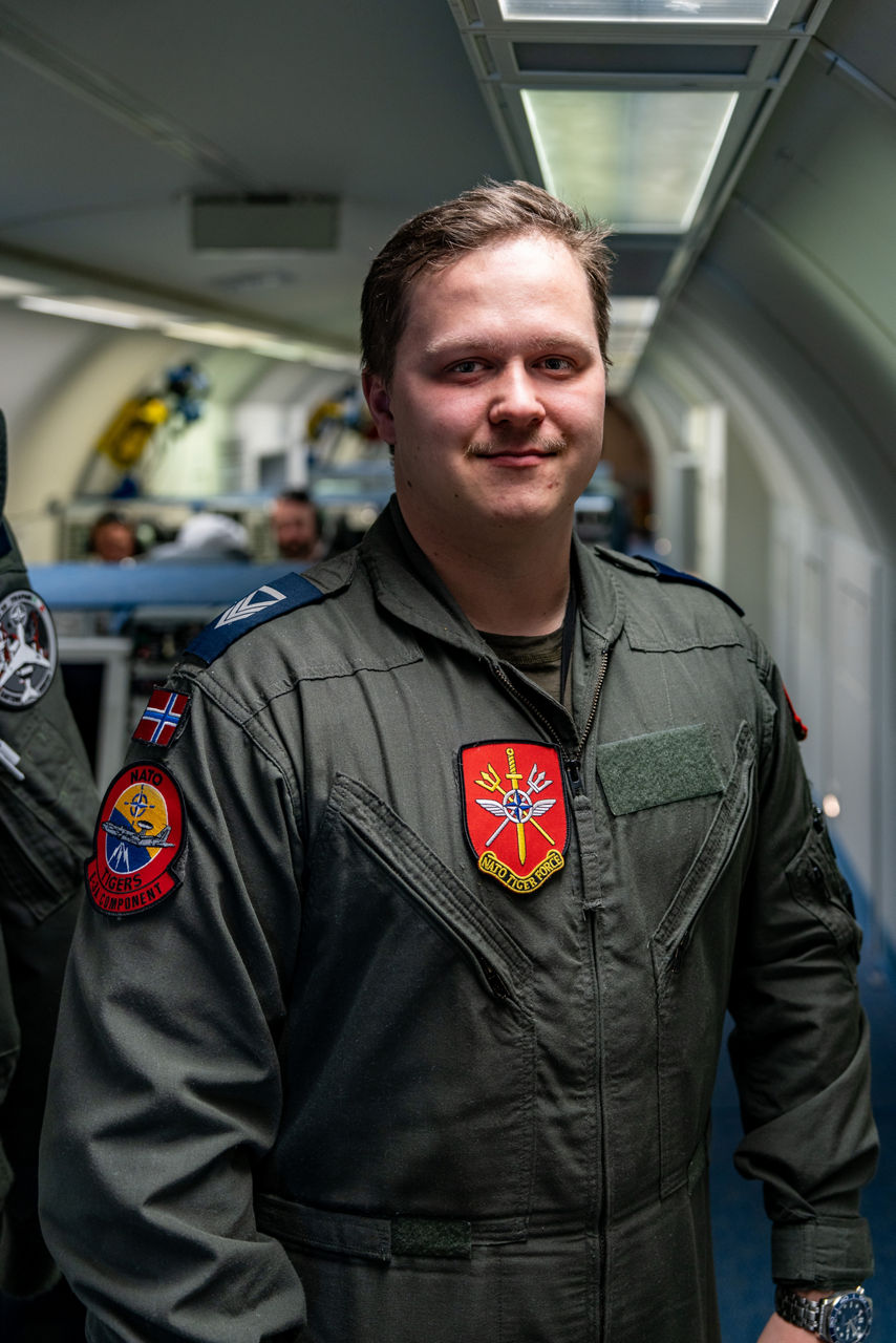 A Danish aircrew member poses for a photo aboard a NATO E‑3A Airborne Warning and Control System (AWACS) aircraft.

NATO’s Airborne Warning and Control System (AWACS) launched its first surveillance flight over the Barents Sea on 6 March 2026 in support of the enhanced vigilance activity “Arctic Sentry.” Arctic Sentry brings together exercises, troops and capabilities from several NATO Allies across the Arctic and the High North. By boosting surveillance and sharpening joint readiness, ”Arctic Sentry”  helps ensure that NATO and Allies can respond together to challenges in one of the world’s most strategically important regions.