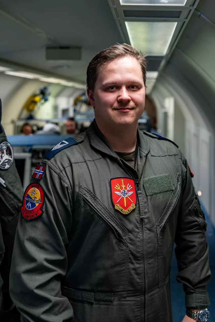 A Danish aircrew member poses for a photo aboard a NATO E‑3A Airborne Warning and Control System (AWACS) aircraft.

NATO’s Airborne Warning and Control System (AWACS) launched its first surveillance flight over the Barents Sea on 6 March 2026 in support of the enhanced vigilance activity “Arctic Sentry.” Arctic Sentry brings together exercises, troops and capabilities from several NATO Allies across the Arctic and the High North. By boosting surveillance and sharpening joint readiness, ”Arctic Sentry”  helps ensure that NATO and Allies can respond together to challenges in one of the world’s most strategically important regions.