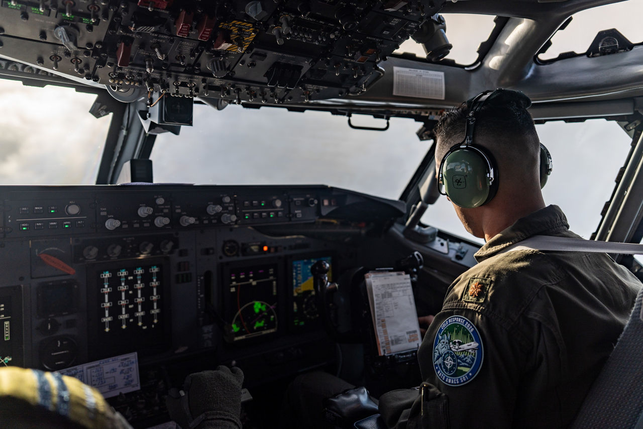 A United States Air Force pilot prepares to land a NATO E‑3A Airborne Warning and Control System (AWACS) aircraft.

NATO’s Airborne Warning and Control System (AWACS) launched its first surveillance flight over the Barents Sea on 6 March 2026 in support of the enhanced vigilance activity “Arctic Sentry.” Arctic Sentry brings together exercises, troops and capabilities from several NATO Allies across the Arctic and the High North. By boosting surveillance and sharpening joint readiness, ”Arctic Sentry”  helps ensure that NATO and Allies can respond together to challenges in one of the world’s most strategically important regions.