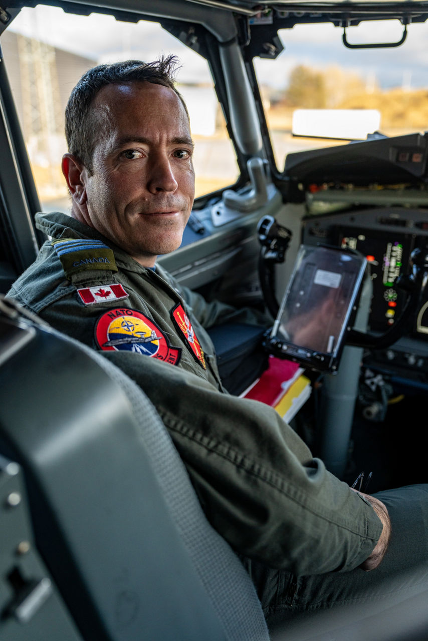 A Royal Canadian Air Force pilot looks towards the camera aboard a NATO E‑3A Airborne Warning and Control System (AWACS) aircraft.

NATO’s Airborne Warning and Control System (AWACS) launched its first surveillance flight over the Barents Sea on 6 March 2026 in support of the enhanced vigilance activity “Arctic Sentry.” Arctic Sentry brings together exercises, troops and capabilities from several NATO Allies across the Arctic and the High North. By boosting surveillance and sharpening joint readiness, ”Arctic Sentry”  helps ensure that NATO and Allies can respond together to challenges in one of the world’s most strategically important regions.