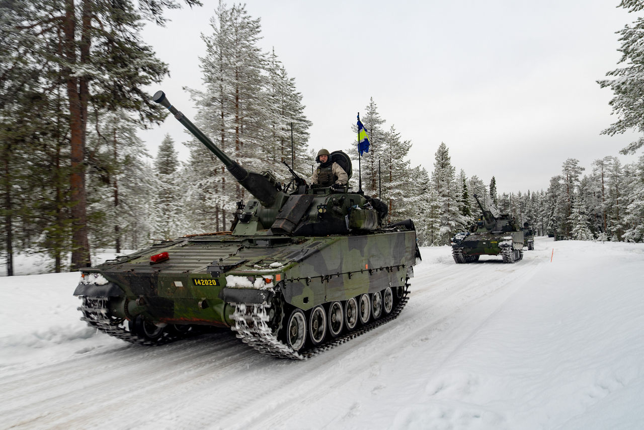 Swedish CV90s roll across the snow-covered terrain in harsh Arctic conditions.

Exercise Cold Response 2026 brought together more than 32,000 troops from 14 Allied nations for intensive training above the Arctic circle in Norway and Finland. In Lapland, Finland, soldiers trained side‑by‑side to reinforce defensive positions and carry out tasks that test their endurance and teamwork in an environment where freezing temperatures, deep snow and long distances make every movement a challenge. Working together in these tough conditions helps Allies improve coordination, build trust and stay ready to work together in the harsh Arctic conditions, whenever needed. Cold Response is part of NATO’s recently established vigilance activity Arctic Sentry, dedicated to the defence and security of the High North and the Arctic.