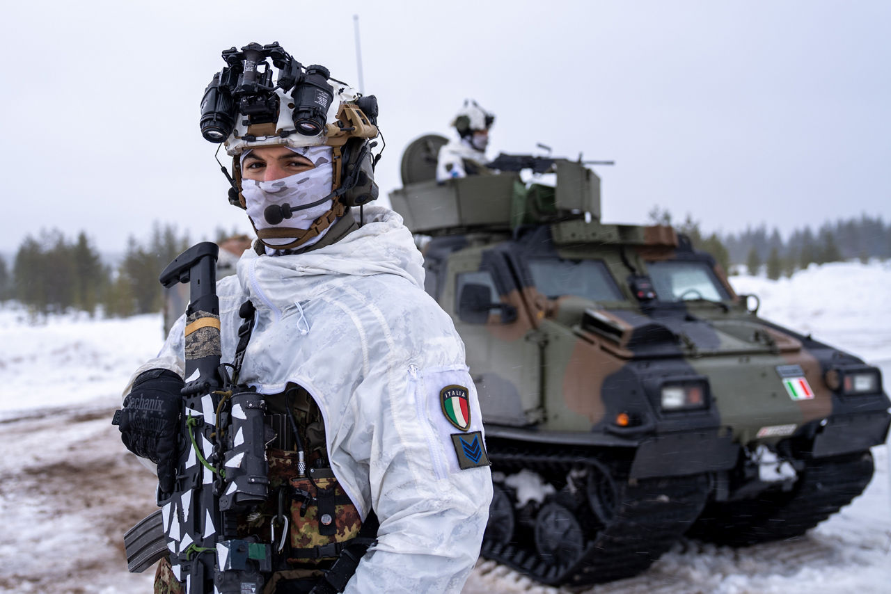 An Italian soldier stands for a photo during Exercise Cold Response 26.

Exercise Cold Response 2026 brought together more than 32,000 troops from 14 Allied nations for intensive training above the Arctic circle in Norway and Finland. In Lapland, Finland, soldiers trained side‑by‑side to reinforce defensive positions and carry out tasks that test their endurance and teamwork in an environment where freezing temperatures, deep snow and long distances make every movement a challenge. Working together in these tough conditions helps Allies improve coordination, build trust and stay ready to work together in the harsh Arctic conditions, whenever needed. Cold Response is part of NATO’s recently established vigilance activity Arctic Sentry, dedicated to the defence and security of the High North and the Arctic.