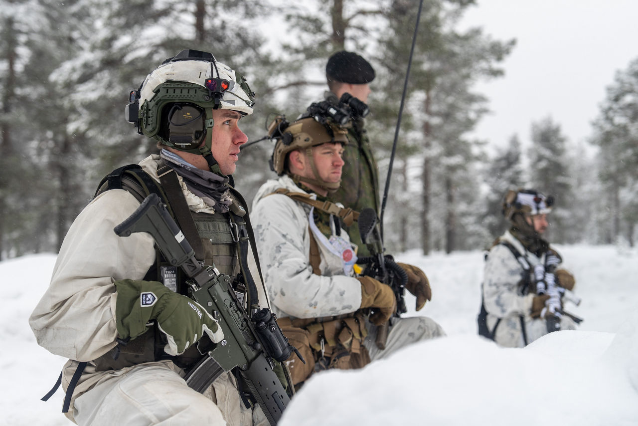 US Marines and a Swedish soldier scan the horizon while operating in snowy terrain.

Exercise Cold Response 2026 brought together more than 32,000 troops from 14 Allied nations for intensive training above the Arctic circle in Norway and Finland. In Lapland, Finland, soldiers trained side‑by‑side to reinforce defensive positions and carry out tasks that test their endurance and teamwork in an environment where freezing temperatures, deep snow and long distances make every movement a challenge. Working together in these tough conditions helps Allies improve coordination, build trust and stay ready to work together in the harsh Arctic conditions, whenever needed. Cold Response is part of NATO’s recently established vigilance activity Arctic Sentry, dedicated to the defence and security of the High North and the Arctic.