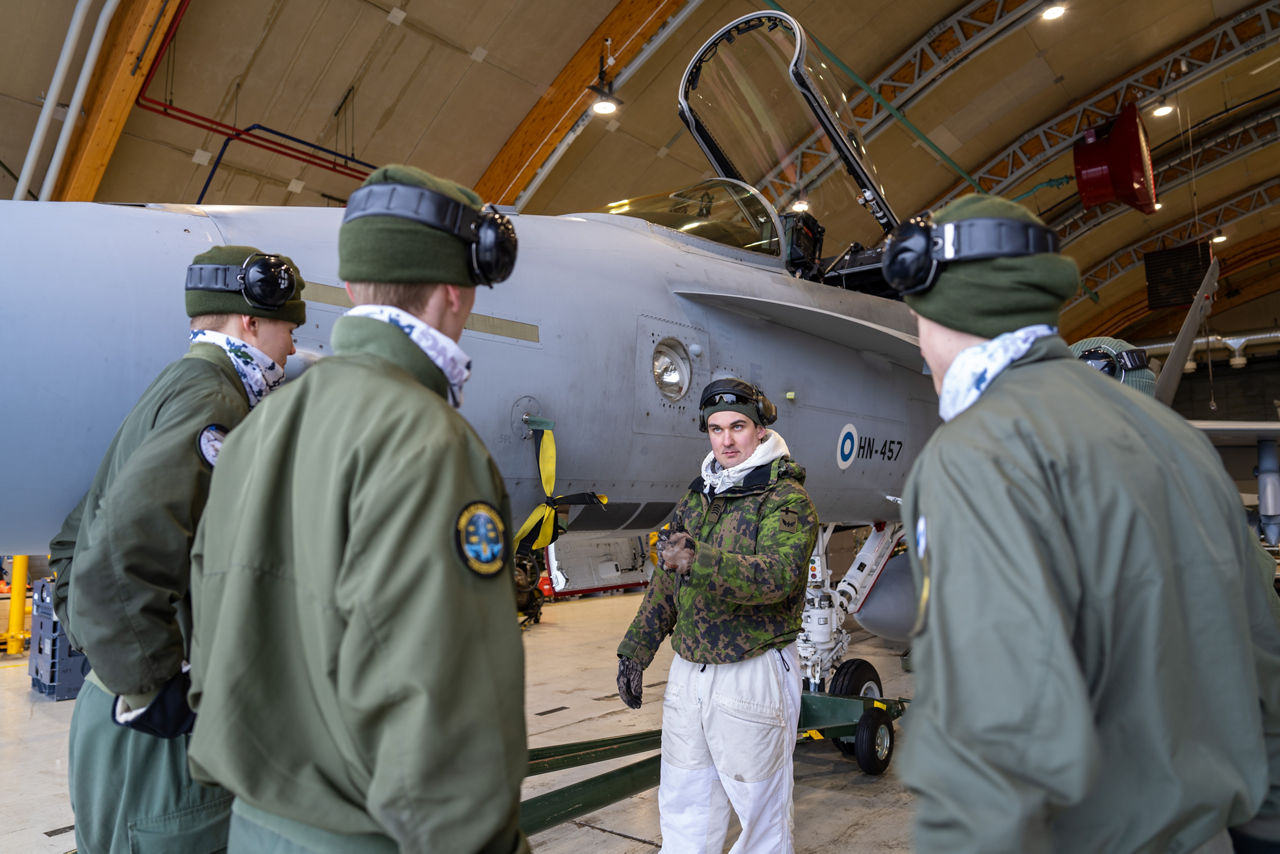 A Finnish aircraft mechanic gives instructions to Finnish conscripts as they work on maintaining a Finnish Air Force F/A‑18 during Exercise Cold Response 2026 in Rovaniemi, Finland.

Exercise Cold Response 2026 showcased how Allied aircraft and aircrews operate in one of the most demanding environments on earth. In Finland’s Lapland region, Finnish F/A-18 fighter jets launched from icy runways while US Marines KC-130 tankers demonstrated their vital refuelling capabilities, both in the air, extending mission range, and on the ground, where they can set up temporary refuelling spots to support aircraft operation in remote locations. Pilots, ground crews and support teams trained side by side to maintain aircraft, coordinate sorties and ensure safe operations despite the Arctic’s extreme temperatures and challenging conditions. Cold Response is part of NATO’s recently established vigilance activity Arctic Sentry, dedicated to the defence and security of the High North and the Arctic, and it took place in Norway and Finland from 9 to 20 March 2026.