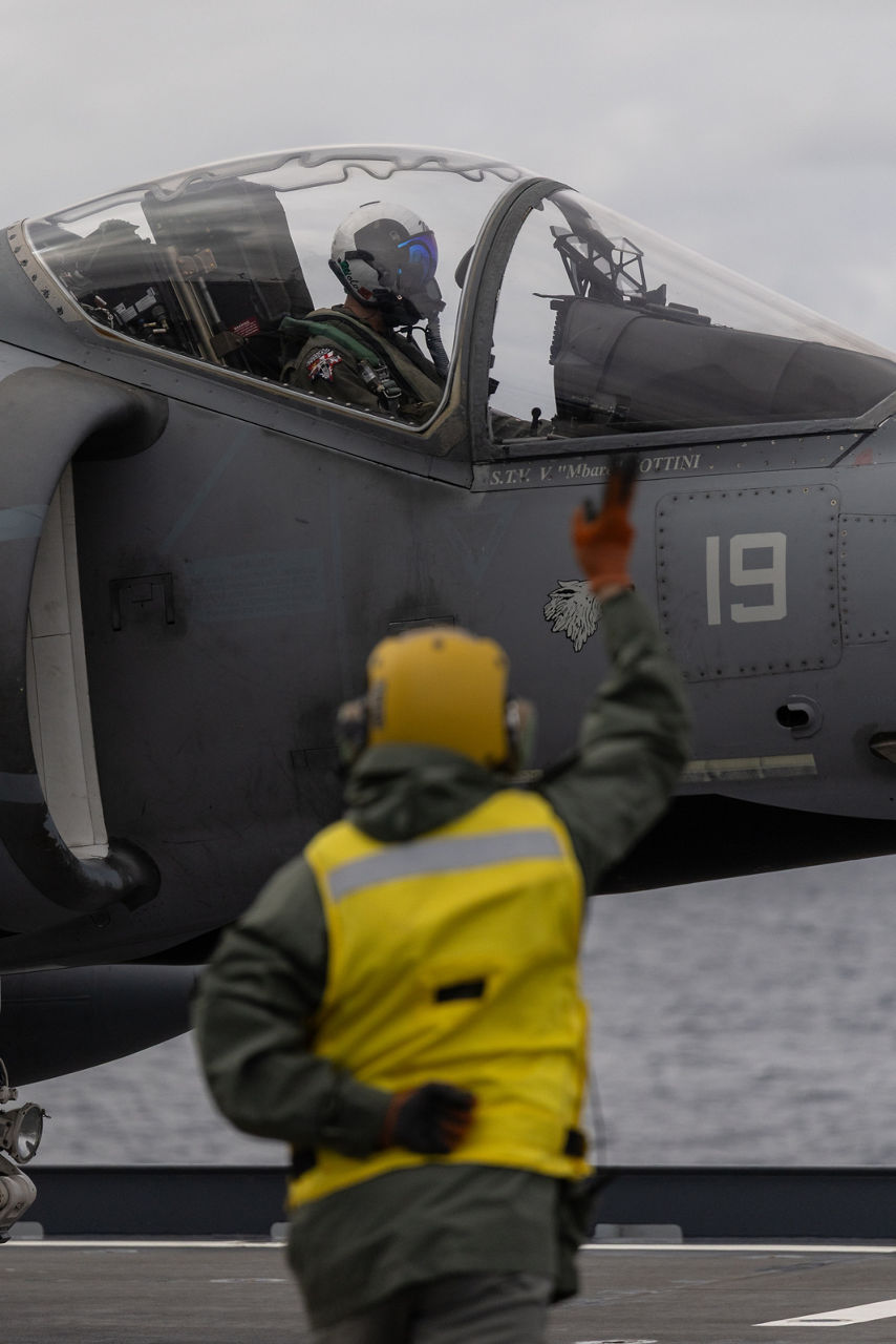 An Italian Navy sailor prepares to launch an AV-8B Harrier II off the aircraft carrier ITS Cavour during Neptune Strike, an enhanced Vigilance Activity taking place in the Western and Central Mediterranean Sea from 25 March to 1 April 2026. Naval Striking and Support Forces NATO (STRIKFORNATO), a Portugal-based maritime command, leads several Neptune Strike iterations every year, focusing on improving Allied integration at sea while expanding our presence and awareness. This iteration involved Carrier Strike Groups from France, Italy and Spain.