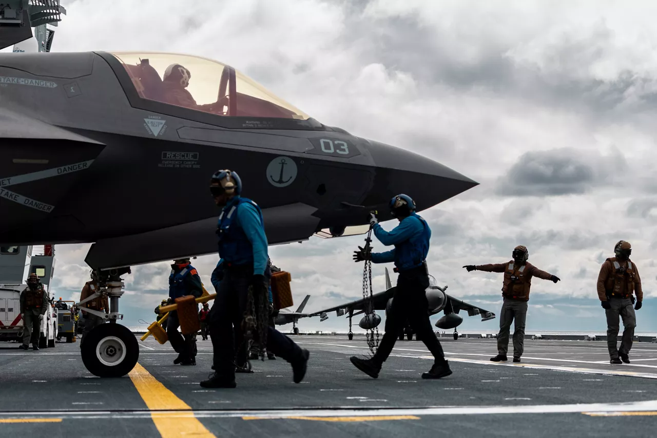 Italian Navy sailors prepare to tie down a recently-landed F-35B Lightning II fighter aboard the aircraft carrier ITS Cavour during Neptune Strike, an enhanced Vigilance Activity taking place in the Western and Central Mediterranean Sea from 25 March to 1 April 2026. Naval Striking and Support Forces NATO (STRIKFORNATO), a Portugal-based maritime command, leads several Neptune Strike iterations every year, focusing on improving Allied integration at sea while expanding our presence and awareness. This iteration involved Carrier Strike Groups from France, Italy and Spain.