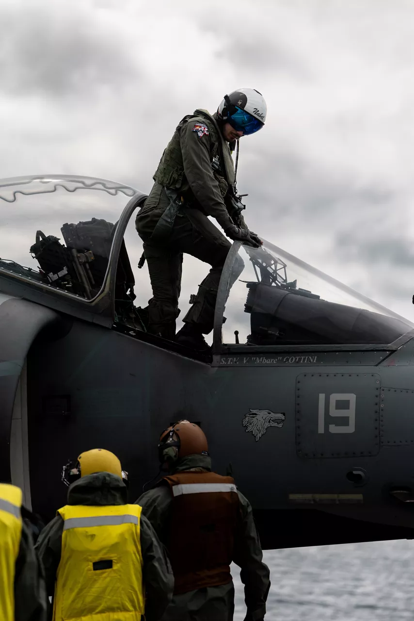 An Italian Navy fighter pilot climbs out of his AV-8B Harrier II after landing on the ITS Cavour during Neptune Strike, an enhanced Vigilance Activity taking place in the Western and Central Mediterranean Sea from 25 March to 1 April 2026. Naval Striking and Support Forces NATO (STRIKFORNATO), a Portugal-based maritime command, leads several Neptune Strike iterations every year, focusing on improving Allied integration at sea while expanding our presence and awareness. This iteration involved Carrier Strike Groups from France, Italy and Spain.