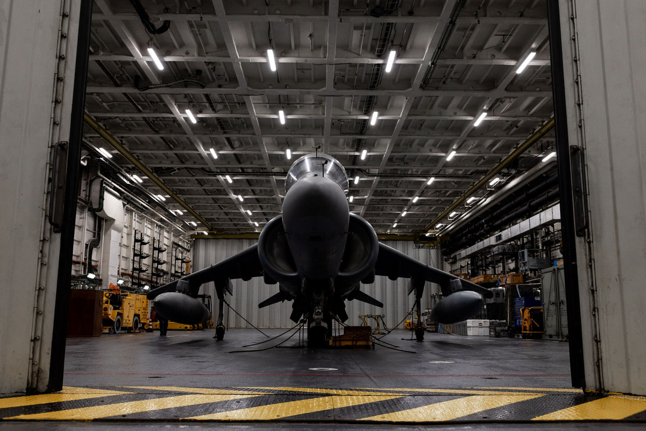 An Italian Navy AV-8B Harrier II vertical takeoff fighter sits in the hangar bay of the aircraft carrier ITS Cavour during Neptune Strike, an enhanced Vigilance Activity taking place in the Western and Central Mediterranean Sea from 25 March to 1 April 2026. Naval Striking and Support Forces NATO (STRIKFORNATO), a Portugal-based maritime command, leads several Neptune Strike iterations every year, focusing on improving Allied integration at sea while expanding our presence and awareness. This iteration involved Carrier Strike Groups from France, Italy and Spain.