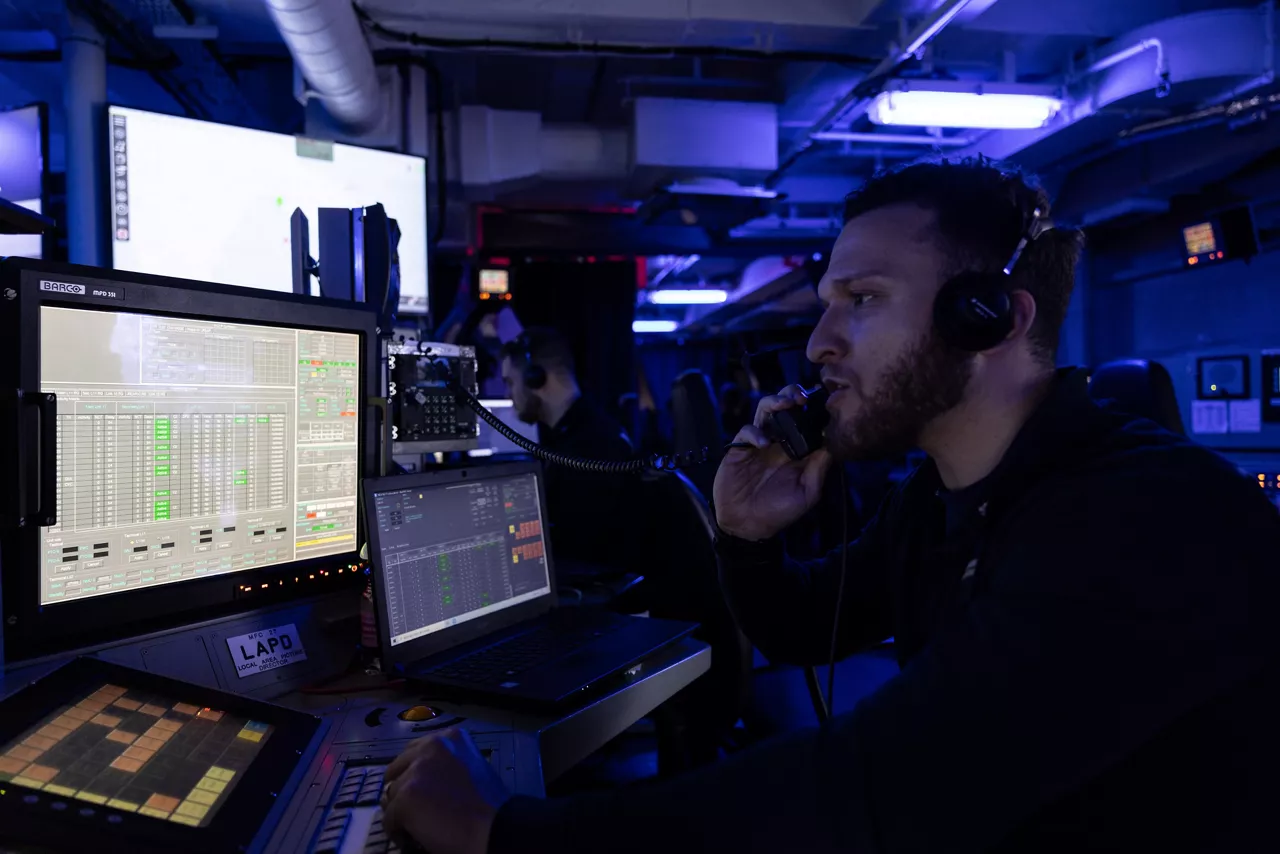 An Italian Navy sailor coordinates operations at his station in the Combat Information Centre aboard the aircraft carrier ITS Cavour during Neptune Strike, an enhanced Vigilance Activity taking place in the Western and Central Mediterranean Sea from 25 March to 1 April 2026. Naval Striking and Support Forces NATO (STRIKFORNATO), a Portugal-based maritime command, leads several Neptune Strike iterations every year, focusing on improving Allied integration at sea while expanding our presence and awareness. This iteration involved Carrier Strike Groups from France, Italy and Spain.