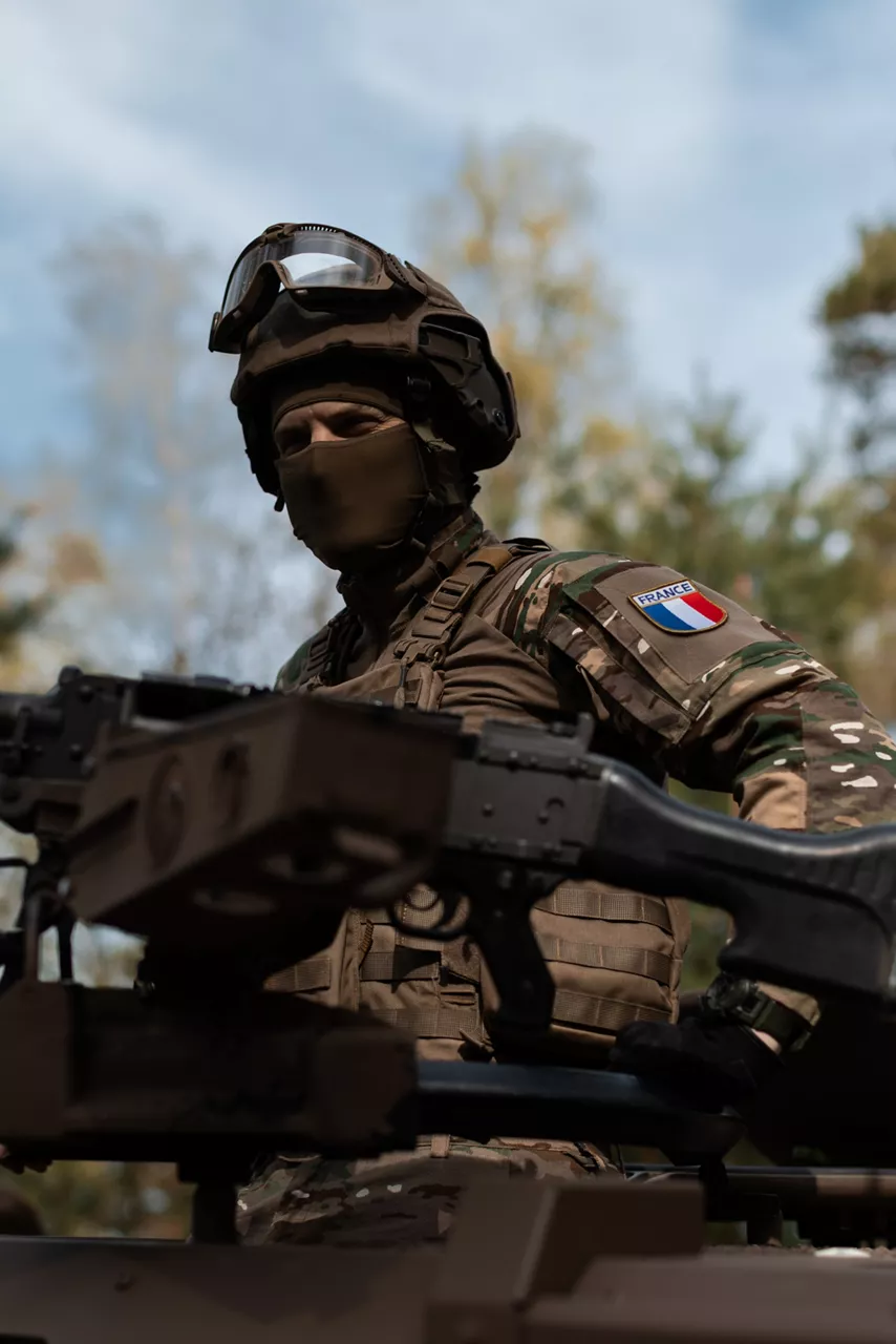 A French Army reconnaissance soldier sits in the turret of his armoured car near Rinkaby, Sweden during Exercise Aurora 26. Past iterations of Aurora, Sweden’s largest military exercise series, focused on mobilising the country’s armed forces for national defence. This year’s iteration also set out to test Sweden’s ability to incorporate Allied forces in those plans. More than 18,000 soldiers from 13 countries participated.