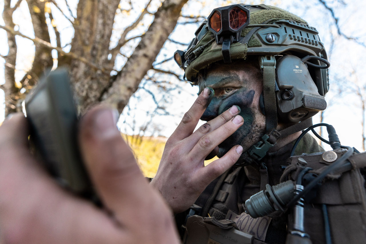 A soldier with the Swedish Army’s South Skåne Regiment applies camouflage face paint near Revingehed, Sweden during Exercise Aurora 26. Past iterations of Aurora, Sweden’s largest military exercise series, focused on mobilising the country’s armed forces for national defence. This year’s iteration also set out to test Sweden’s ability to incorporate Allied forces in those plans. More than 18,000 soldiers from 13 countries participated.