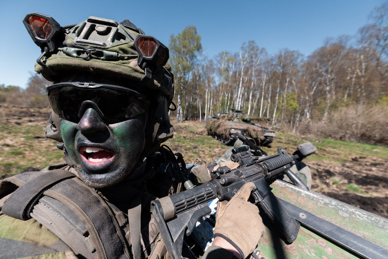 A soldier with the Swedish Army’s South Skåne Regiment shouts at his squad during a training mission near Revingehed, Sweden during Exercise Aurora 26. Past iterations of Aurora, Sweden’s largest military exercise series, focused on mobilising the country’s armed forces for national defence. This year’s iteration also set out to test Sweden’s ability to incorporate Allied forces in those plans. More than 18,000 soldiers from 13 countries participated.